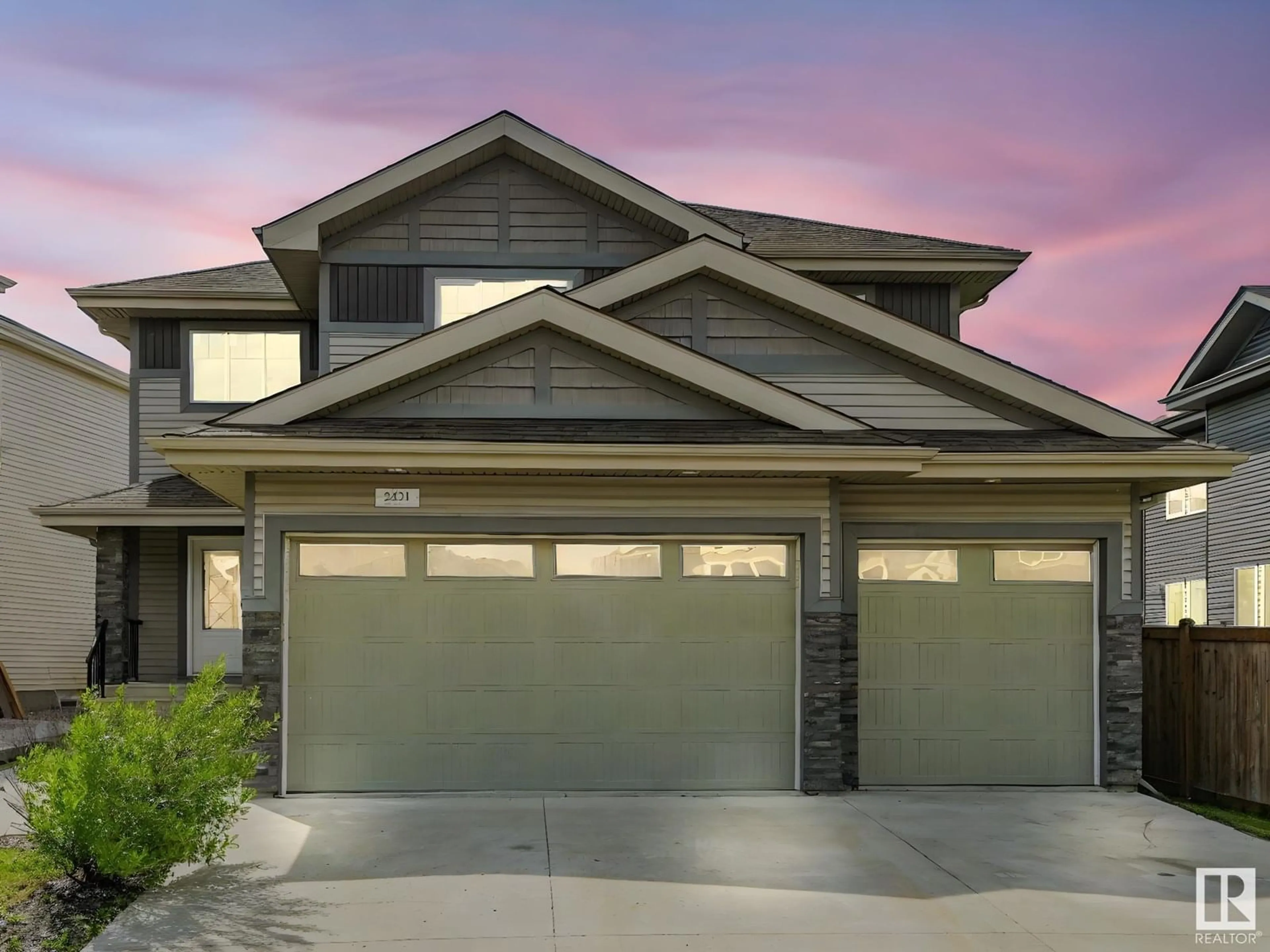 Home with vinyl exterior material, street for 2421 ASHCRAFT CR, Edmonton Alberta T6W2M9