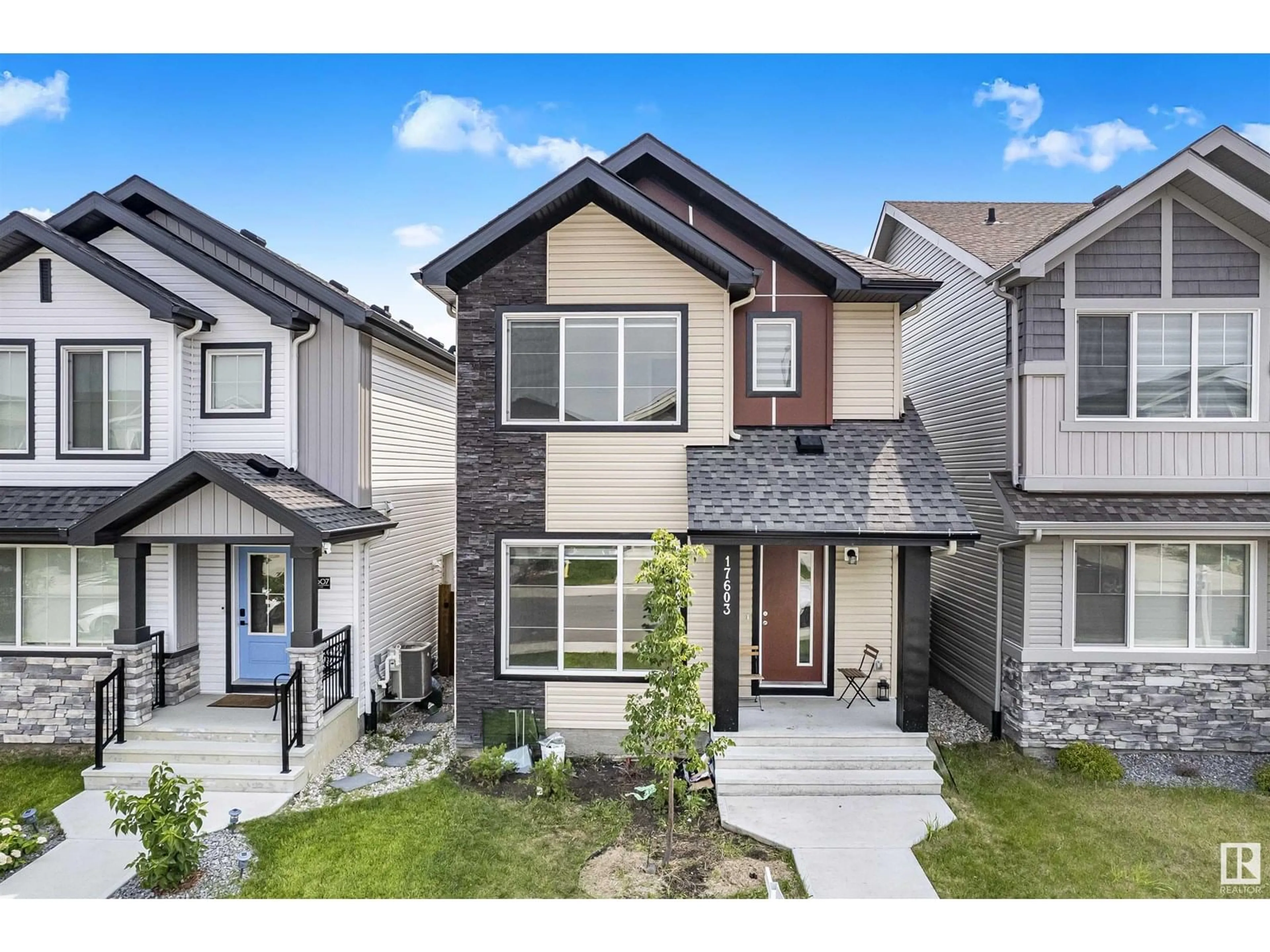 Home with vinyl exterior material, street for 17603 49 ST, Edmonton Alberta T5Y4C6