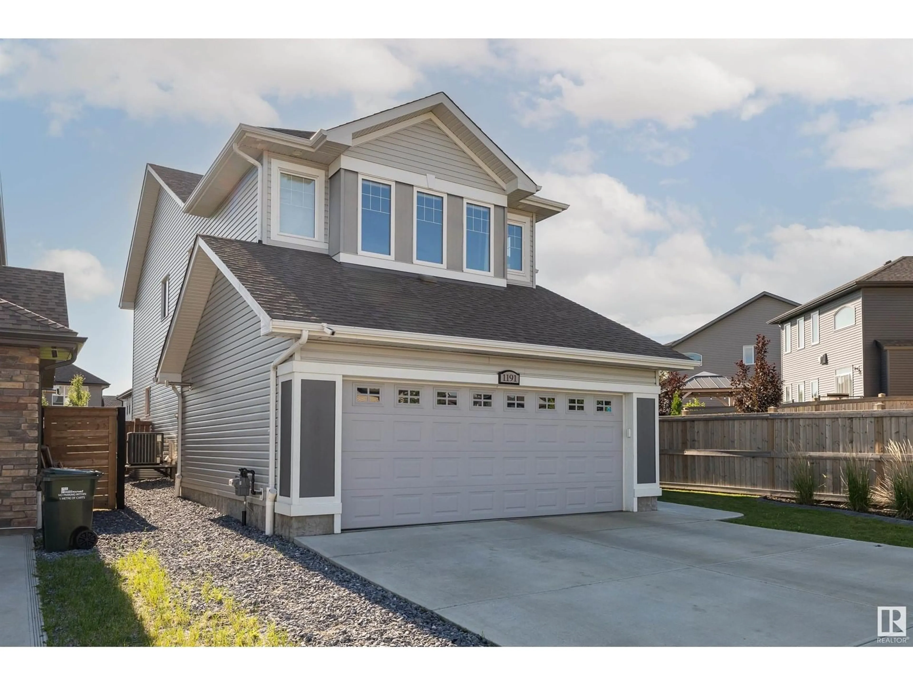 Home with vinyl exterior material, street for 1191 SANDSTONE BV, Sherwood Park Alberta T8H1A9