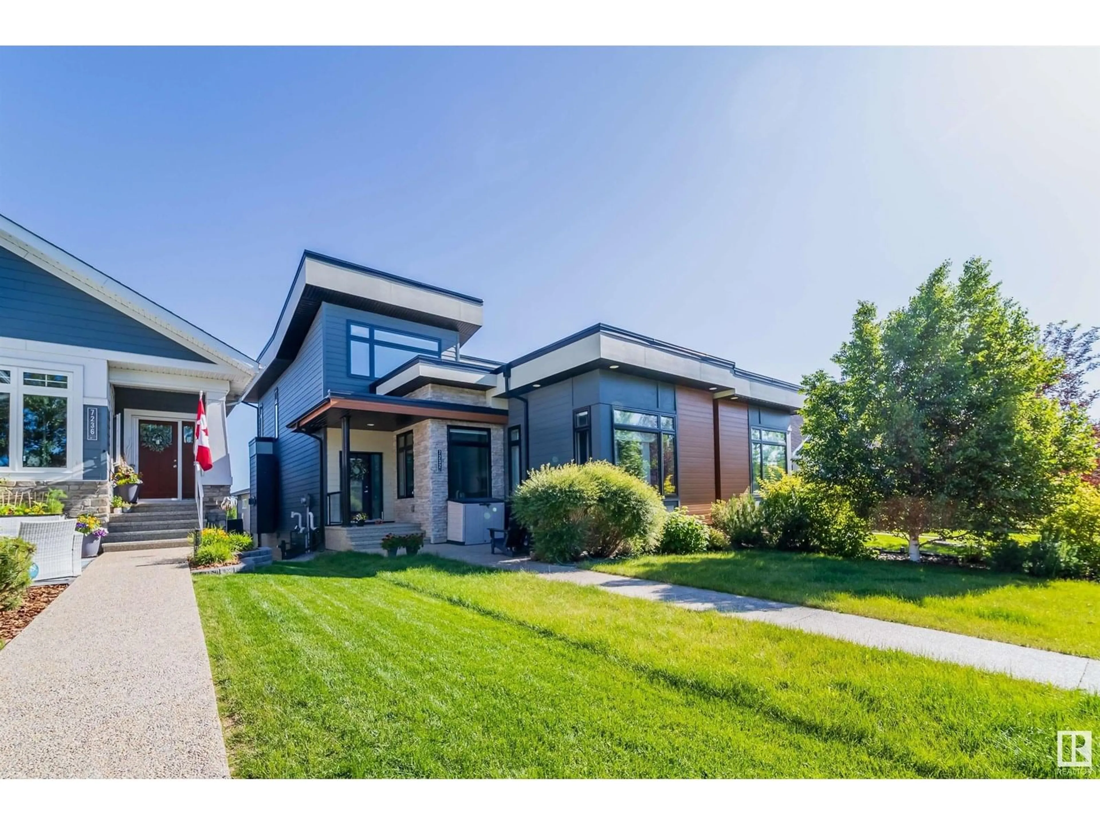 Home with vinyl exterior material, street for 7232 MAY RD, Edmonton Alberta T6R0V8