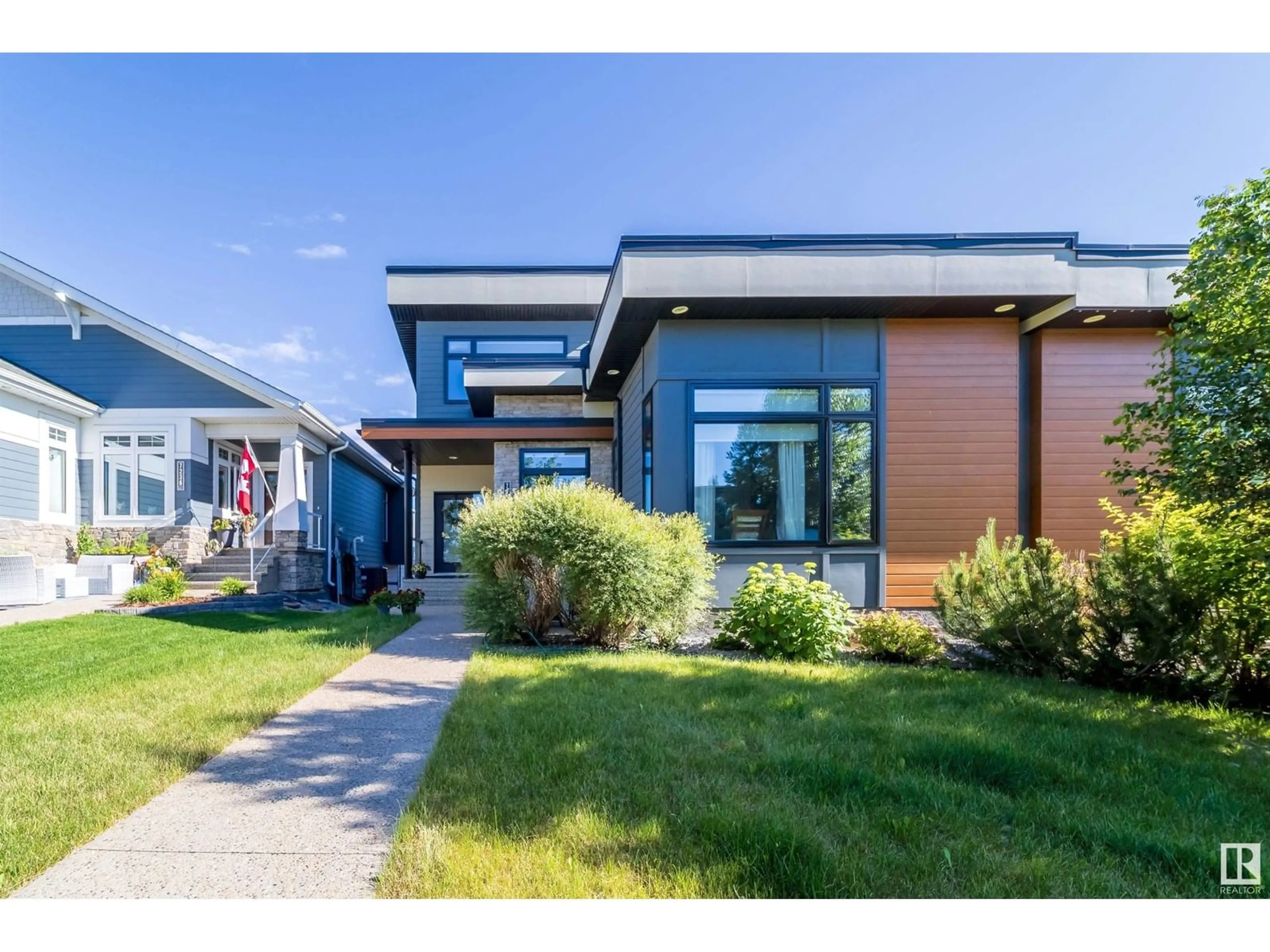 Home with vinyl exterior material, street for 7232 MAY RD, Edmonton Alberta T6R0V8