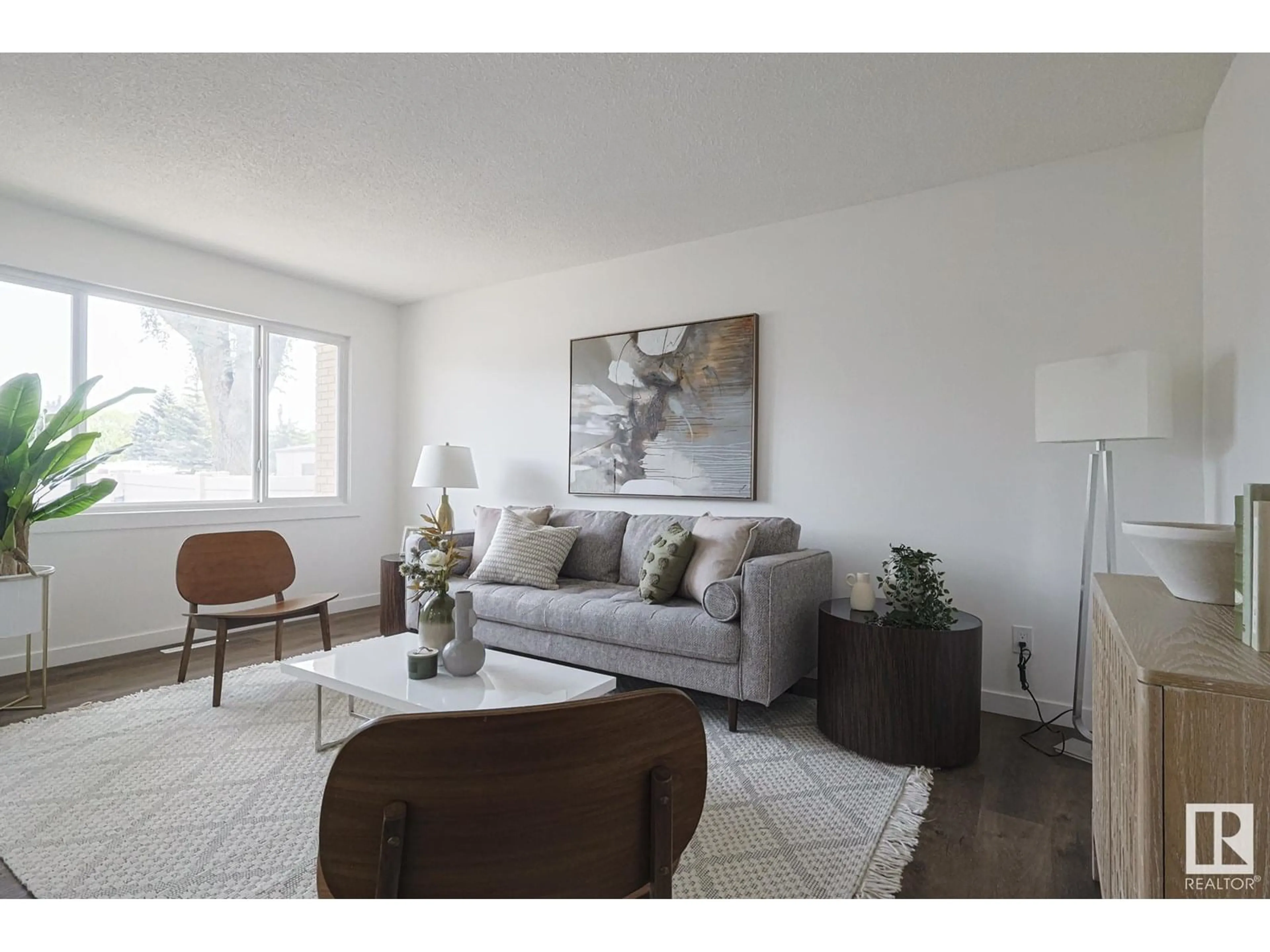Living room with furniture, unknown for 102 LONDONDERRY SQ, Edmonton Alberta T5C3C4
