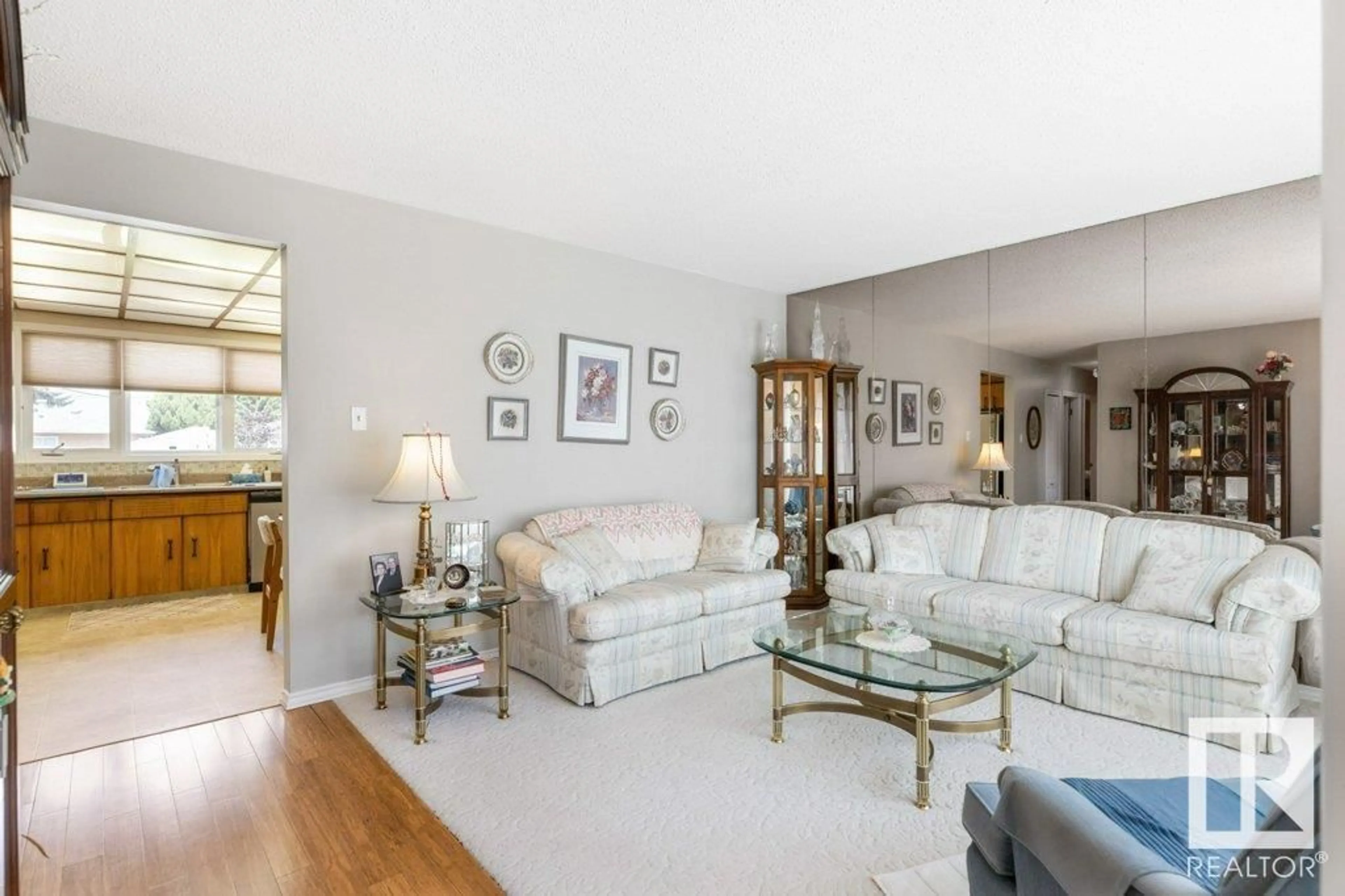 Living room with furniture, unknown for 6840 83 AV, Edmonton Alberta T6B0G5