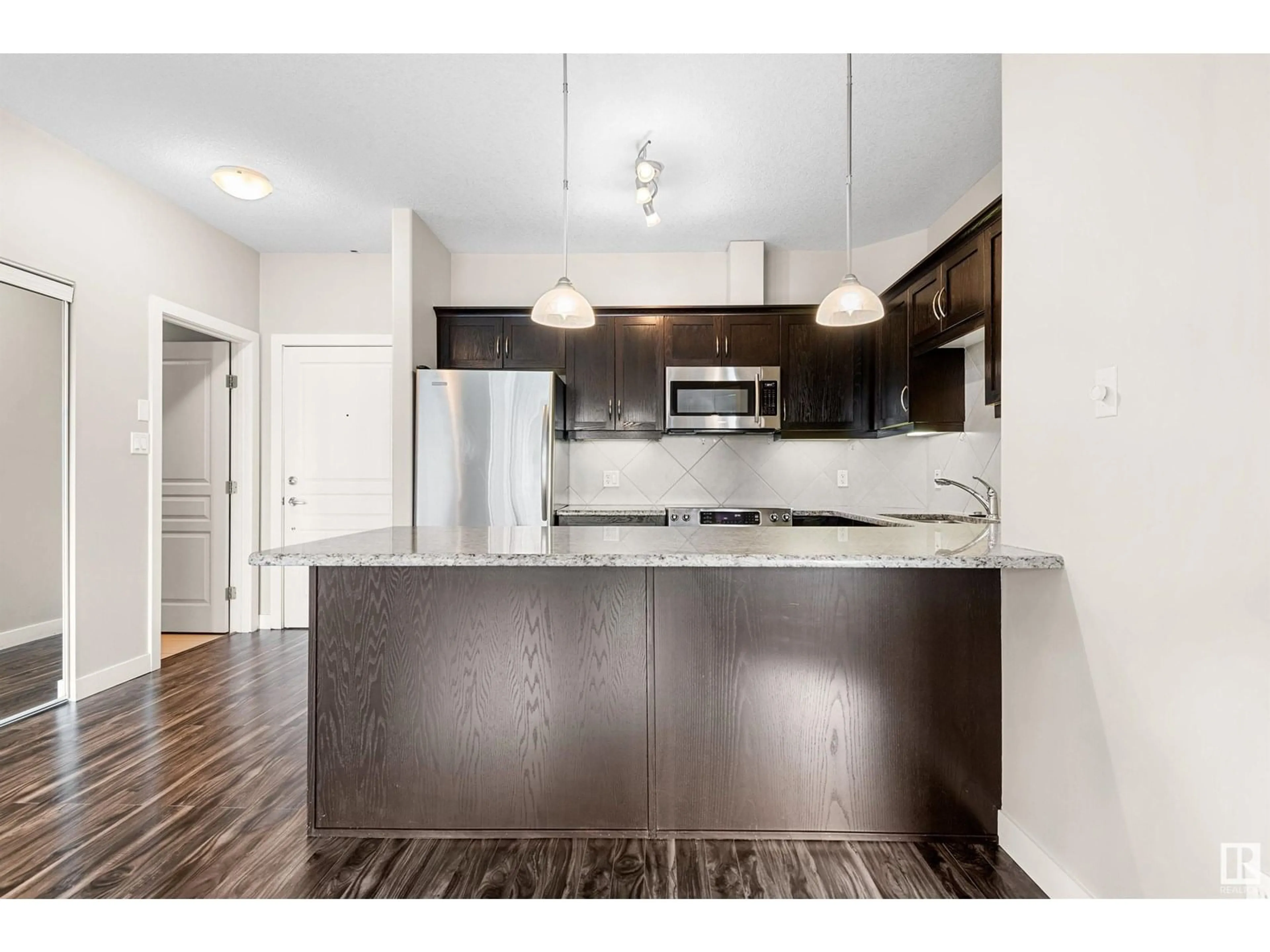 Open concept kitchen, unknown for 3204 - 7347 SOUTH TERWILLEGAR DR, Edmonton Alberta T6R0M3
