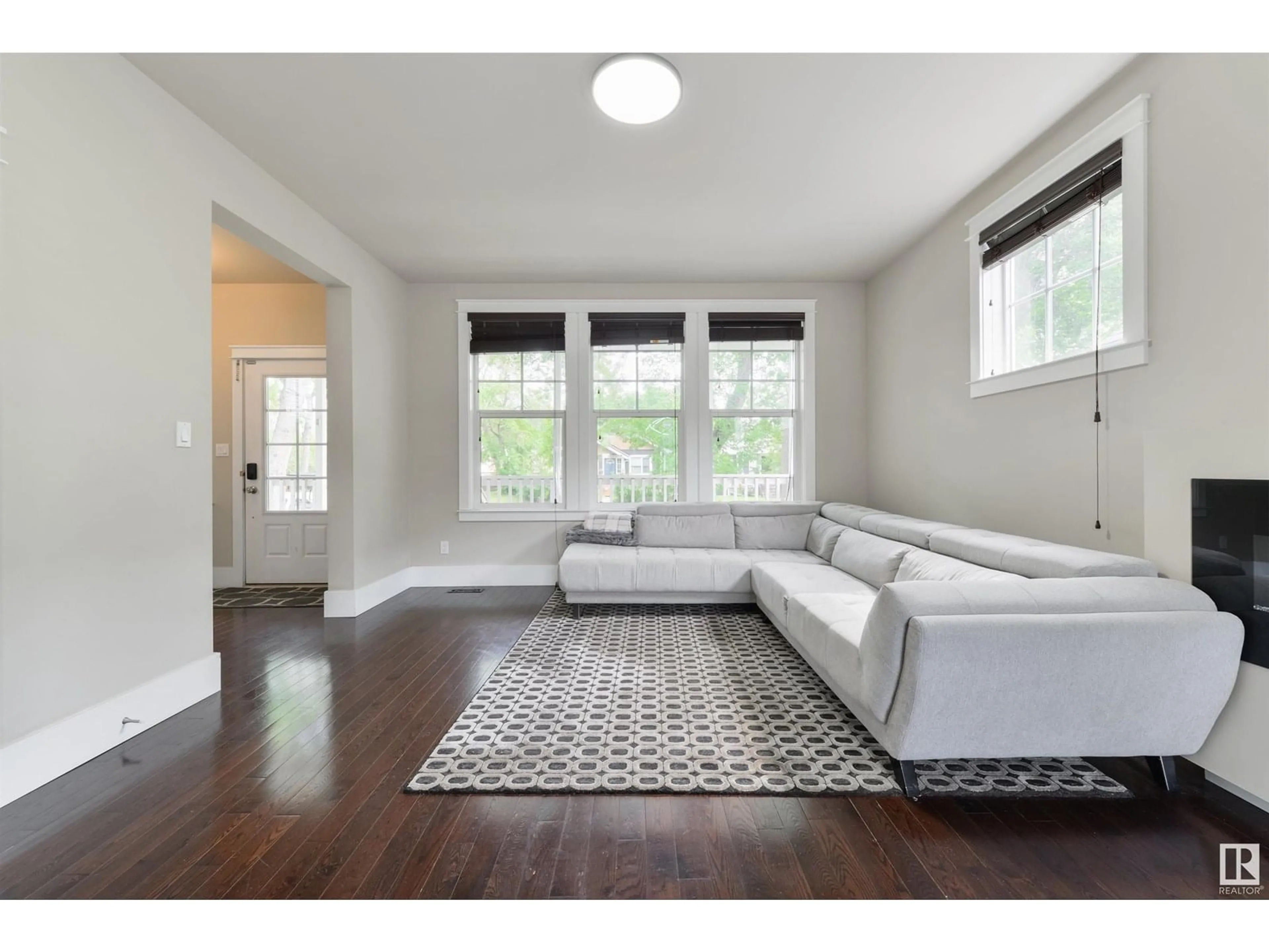 Living room with furniture, unknown for 11216 67 ST, Edmonton Alberta T5B1L1