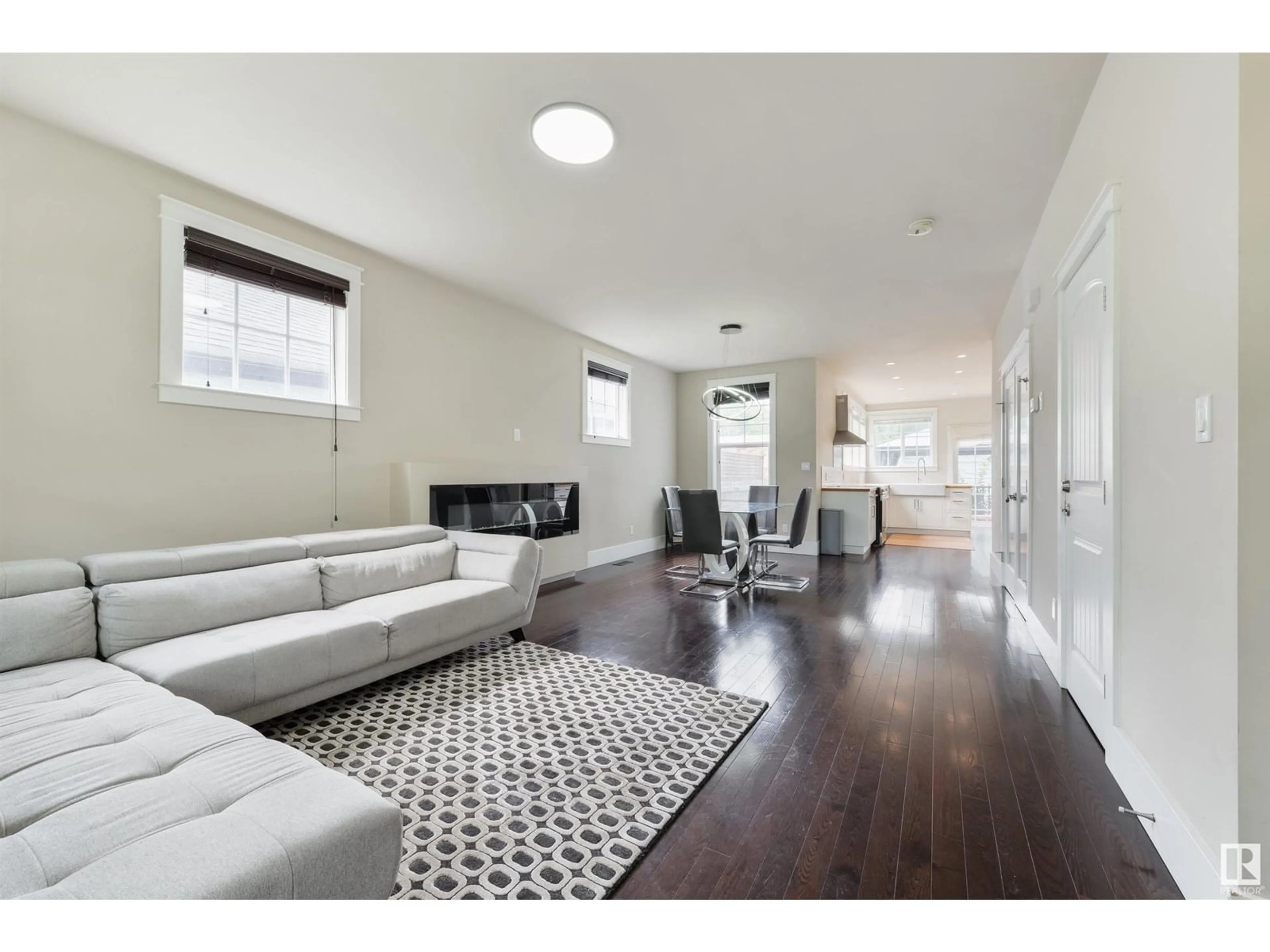Living room with furniture, unknown for 11216 67 ST, Edmonton Alberta T5B1L1