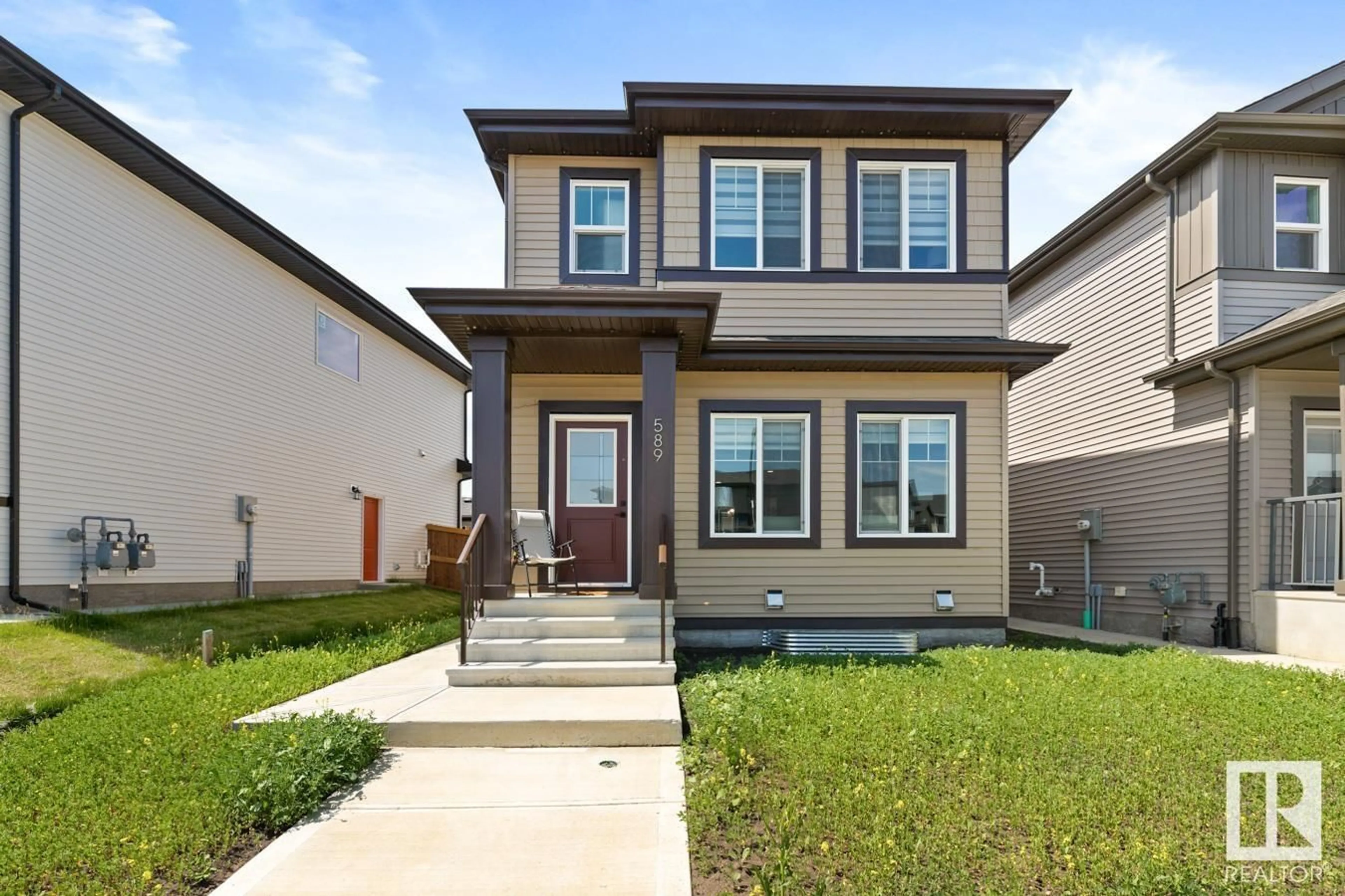 Home with vinyl exterior material, street for 589 BLACK STONE BV, Leduc Alberta T9E1M3