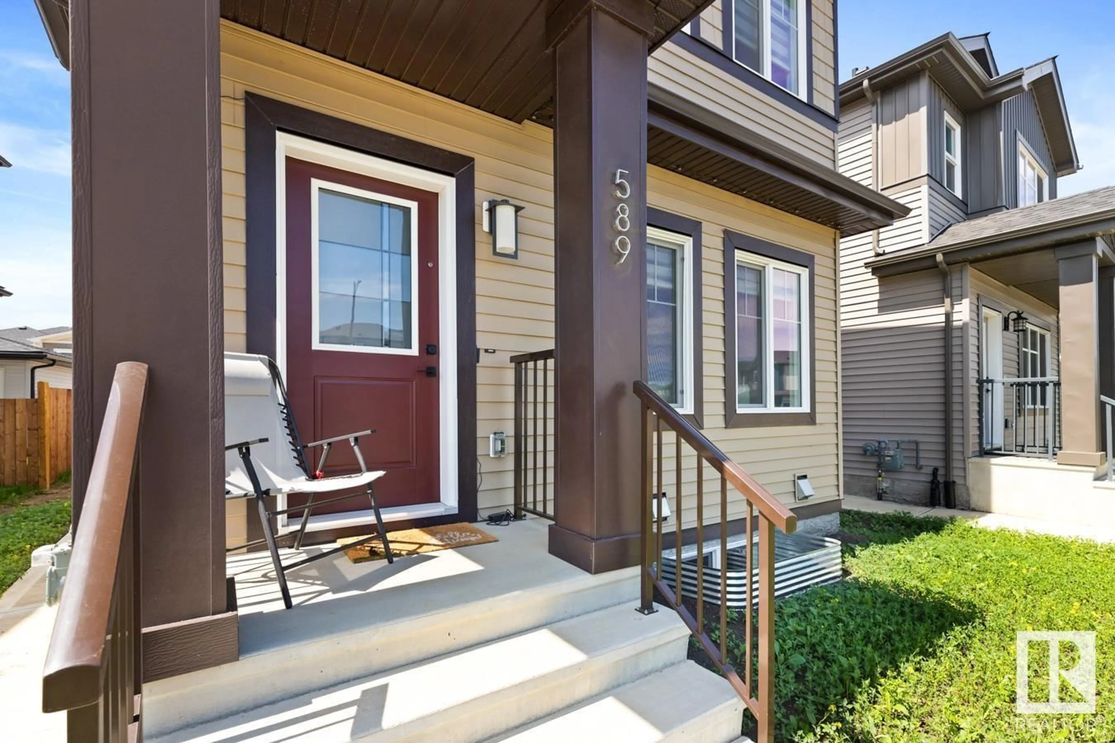 Home with vinyl exterior material, street for 589 BLACK STONE BV, Leduc Alberta T9E1M3