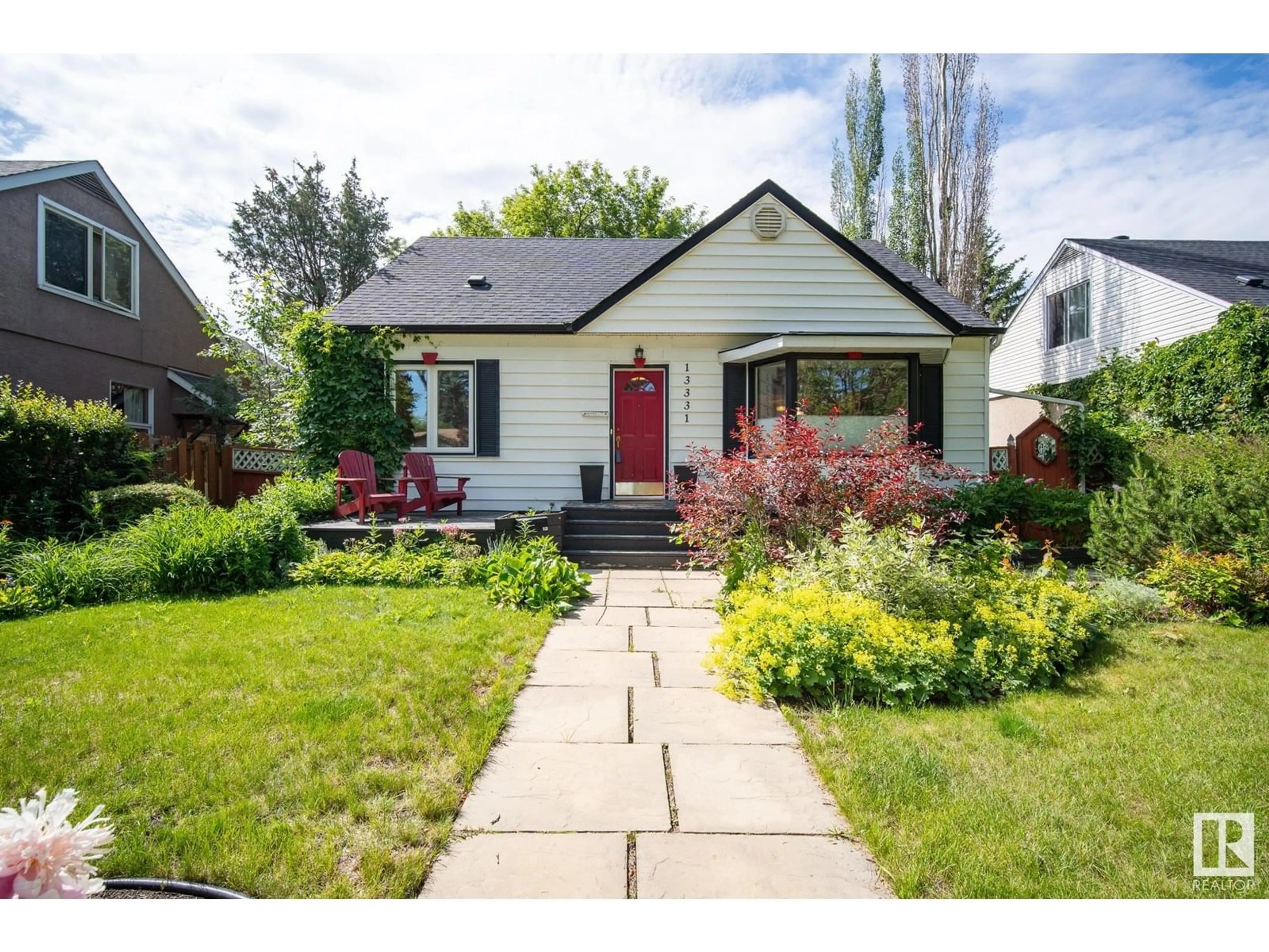 Home with brick exterior material, street for 13331 109B AV AV, Edmonton Alberta T5M2M1