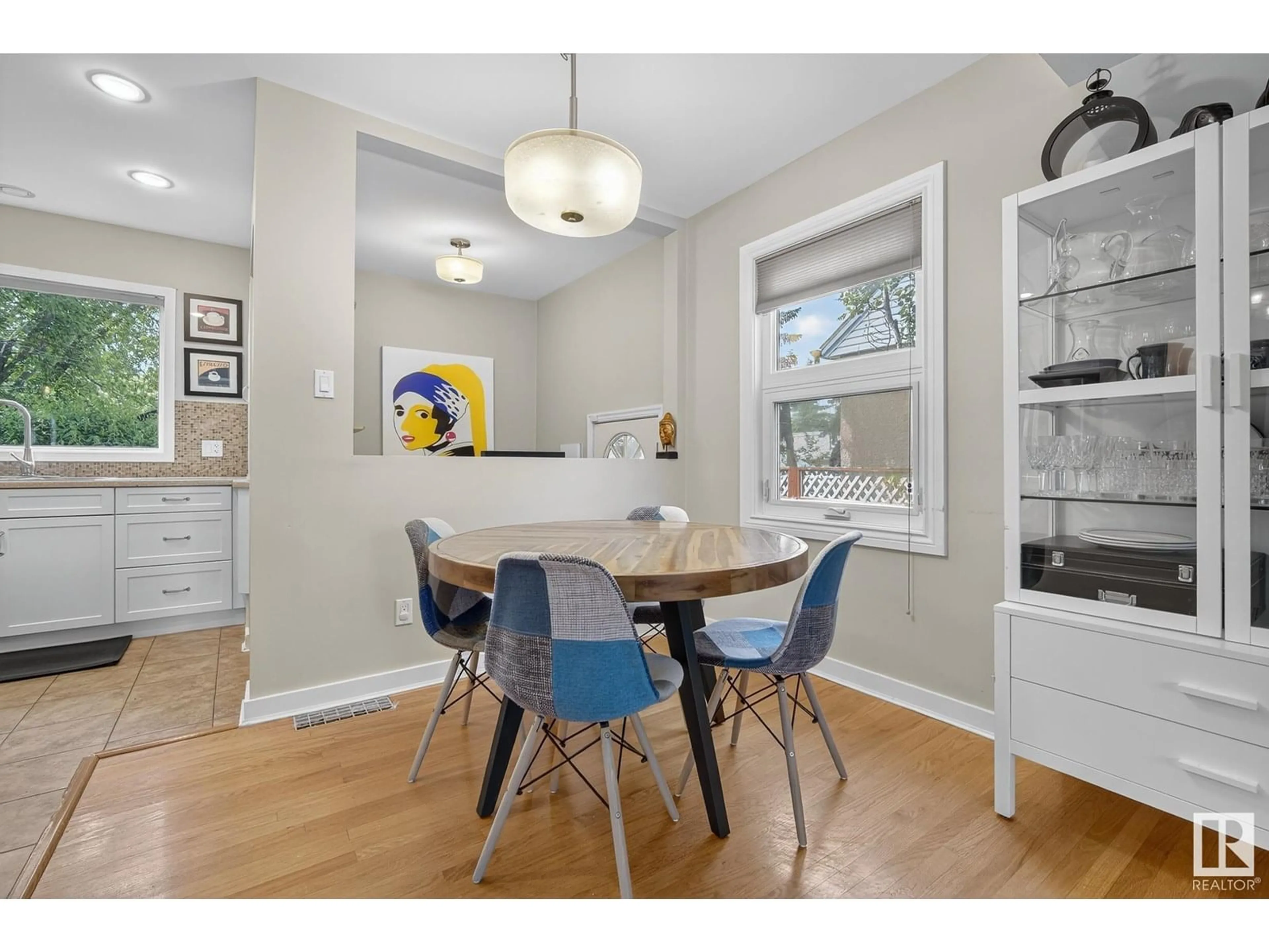 Dining room, wood/laminate floor for 13331 109B AV AV, Edmonton Alberta T5M2M1