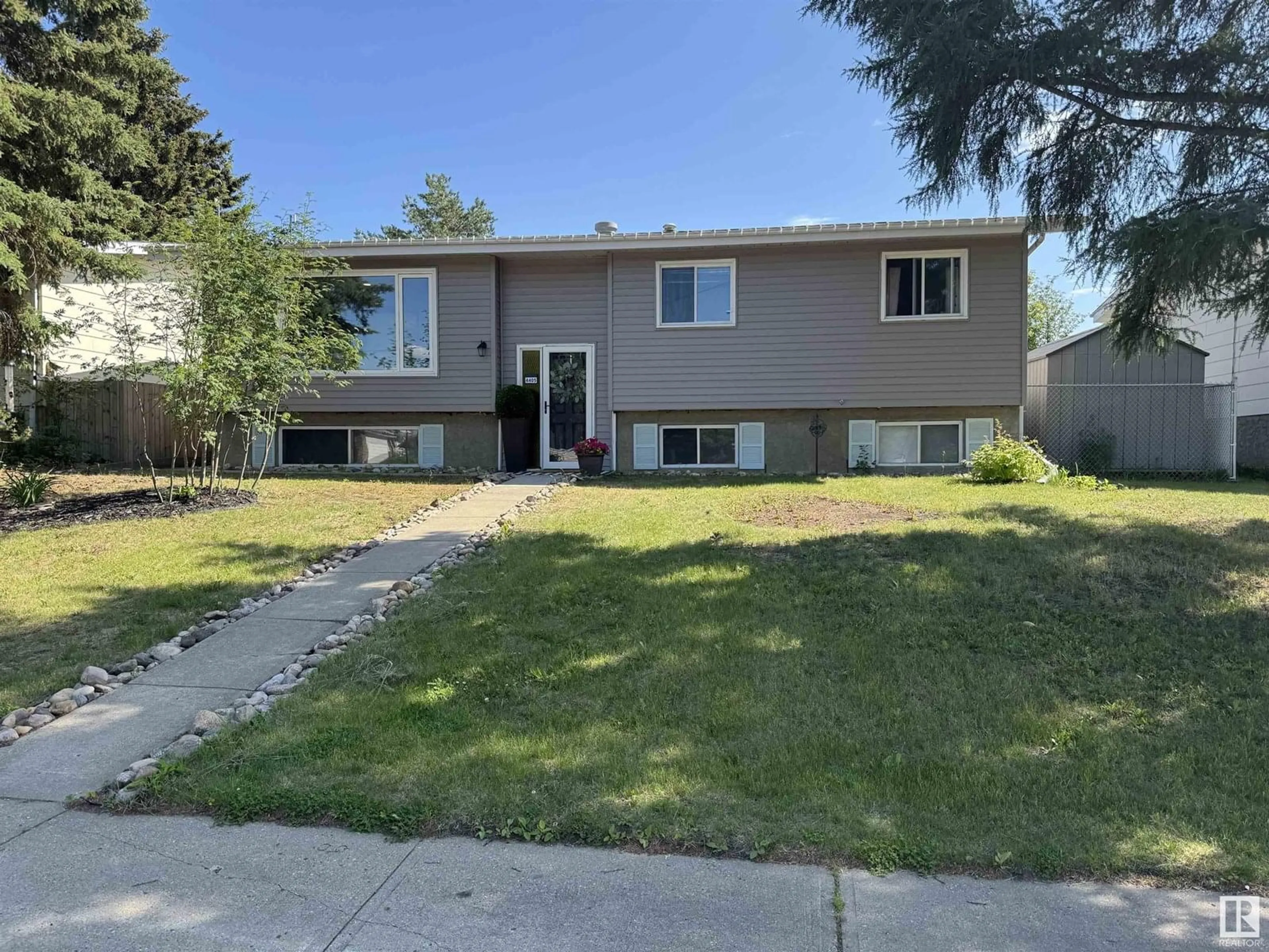 Home with vinyl exterior material, street for 4405 53A AV, Smoky Lake Town Alberta T0A3C0