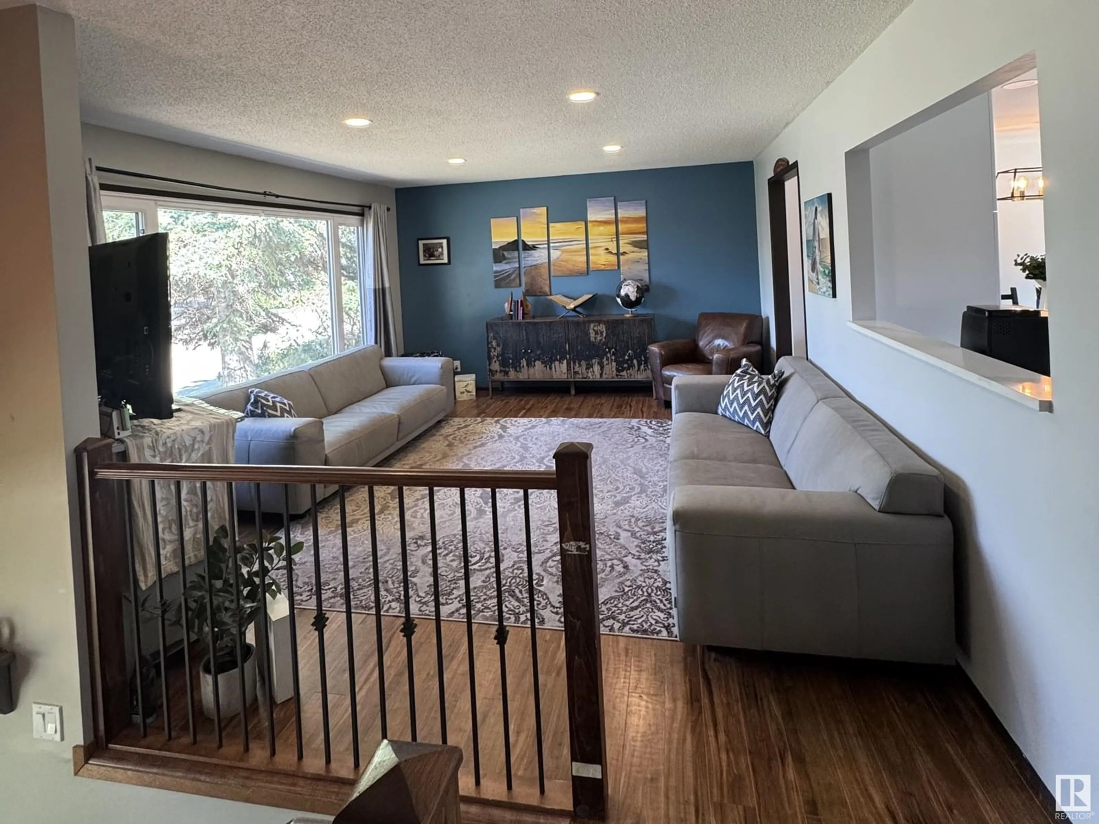 Living room with furniture, wood/laminate floor for 4405 53A AV, Smoky Lake Town Alberta T0A3C0