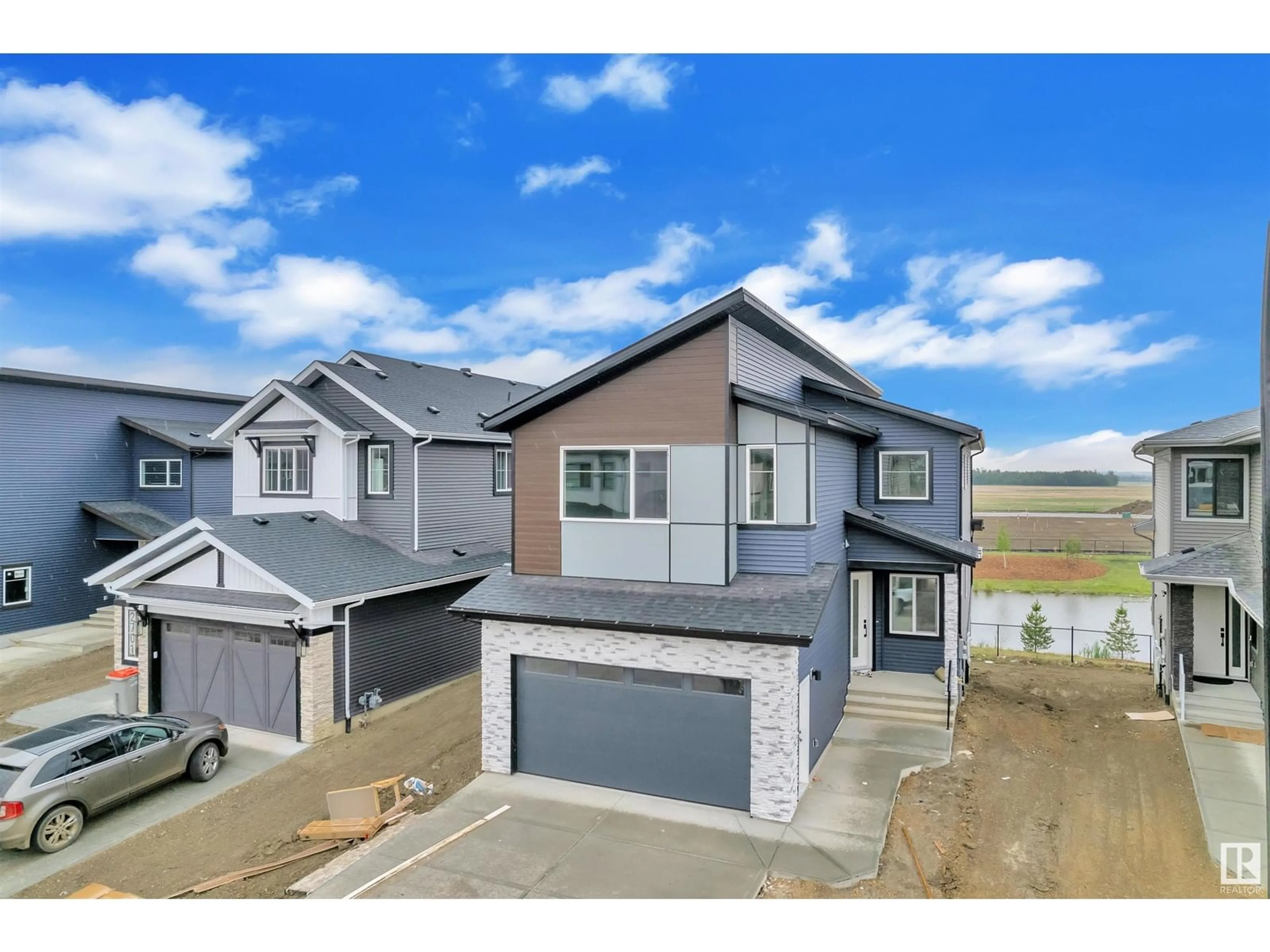 A pic from outside/outdoor area/front of a property/back of a property/a pic from drone, street for NE - 2641 63 AV, Rural Leduc County Alberta T4X3A6