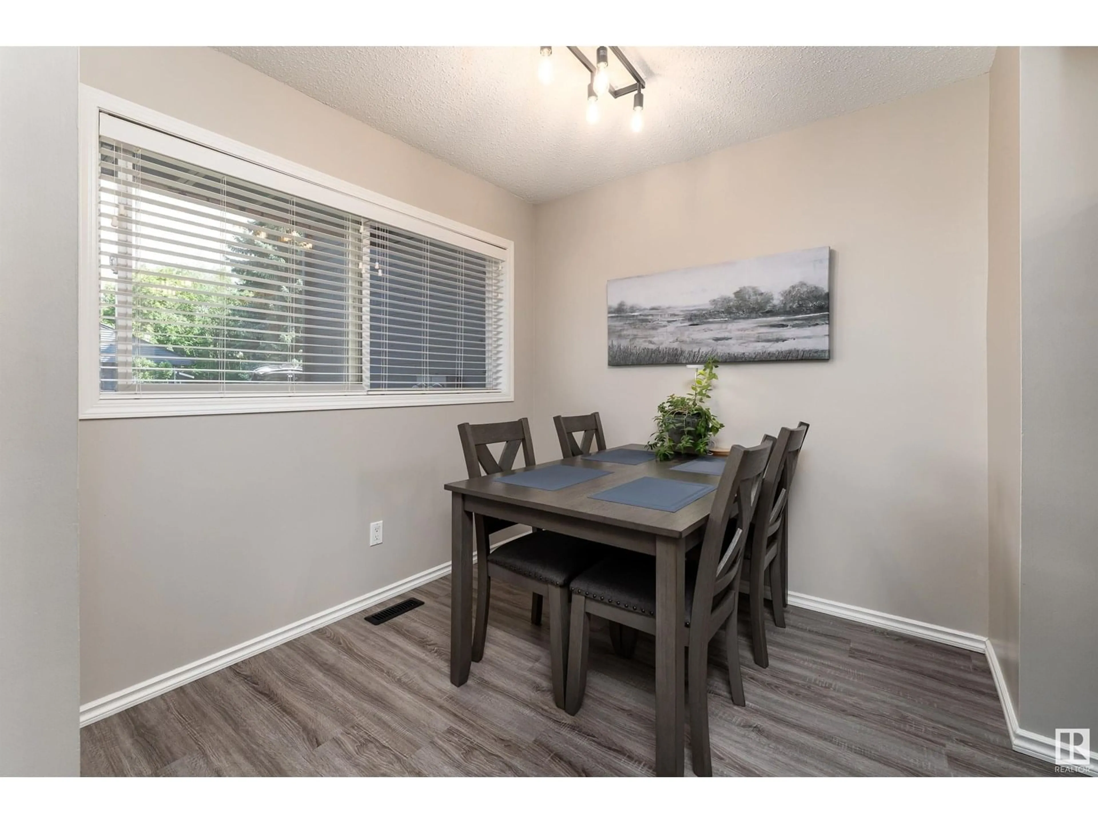 Dining room, wood/laminate floor for 81 - 114 GRANDIN RD, St. Albert Alberta T8N5G8