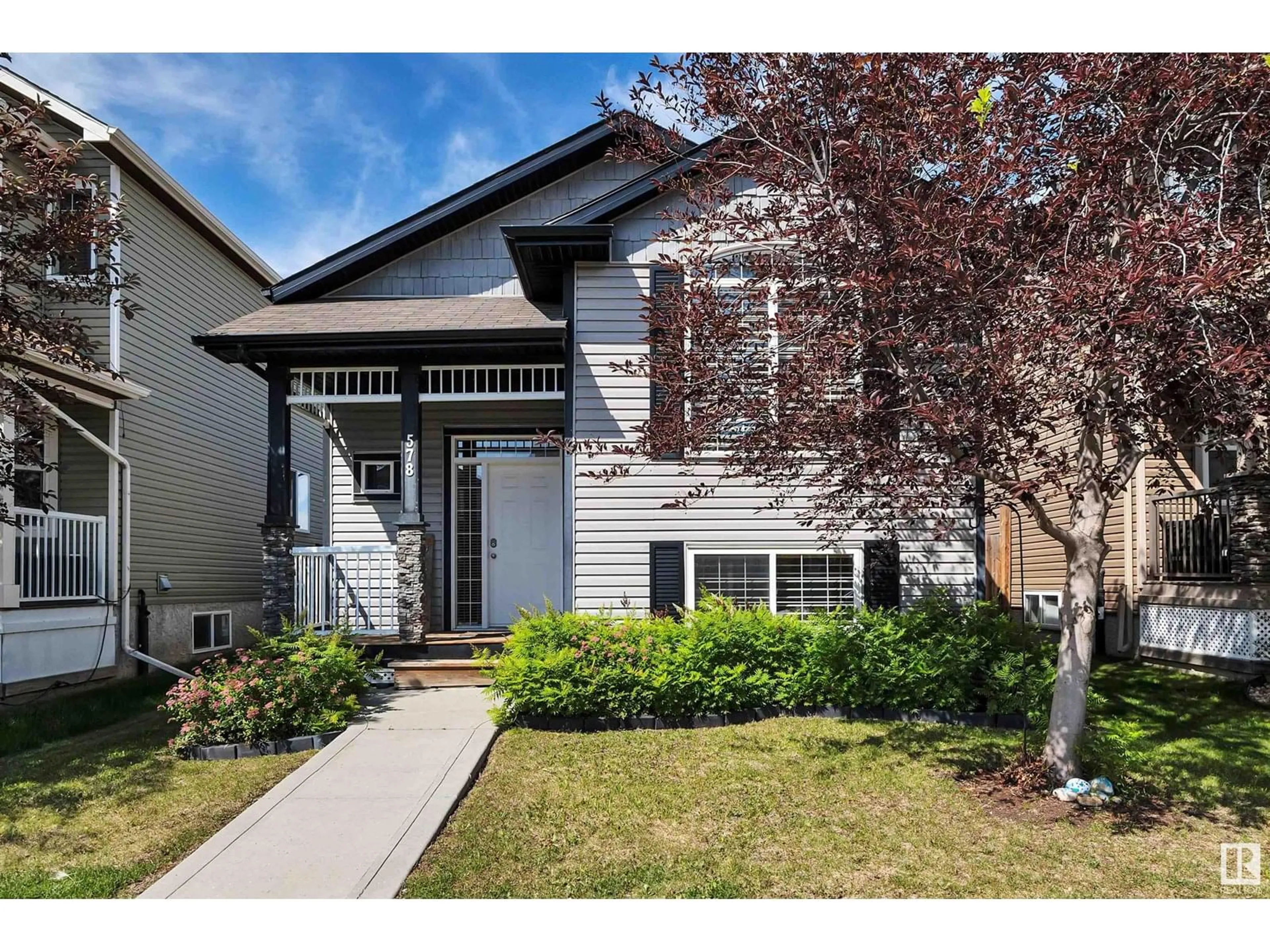 Home with vinyl exterior material, street for 578 SONGHURST WY, Leduc Alberta T9E0R2