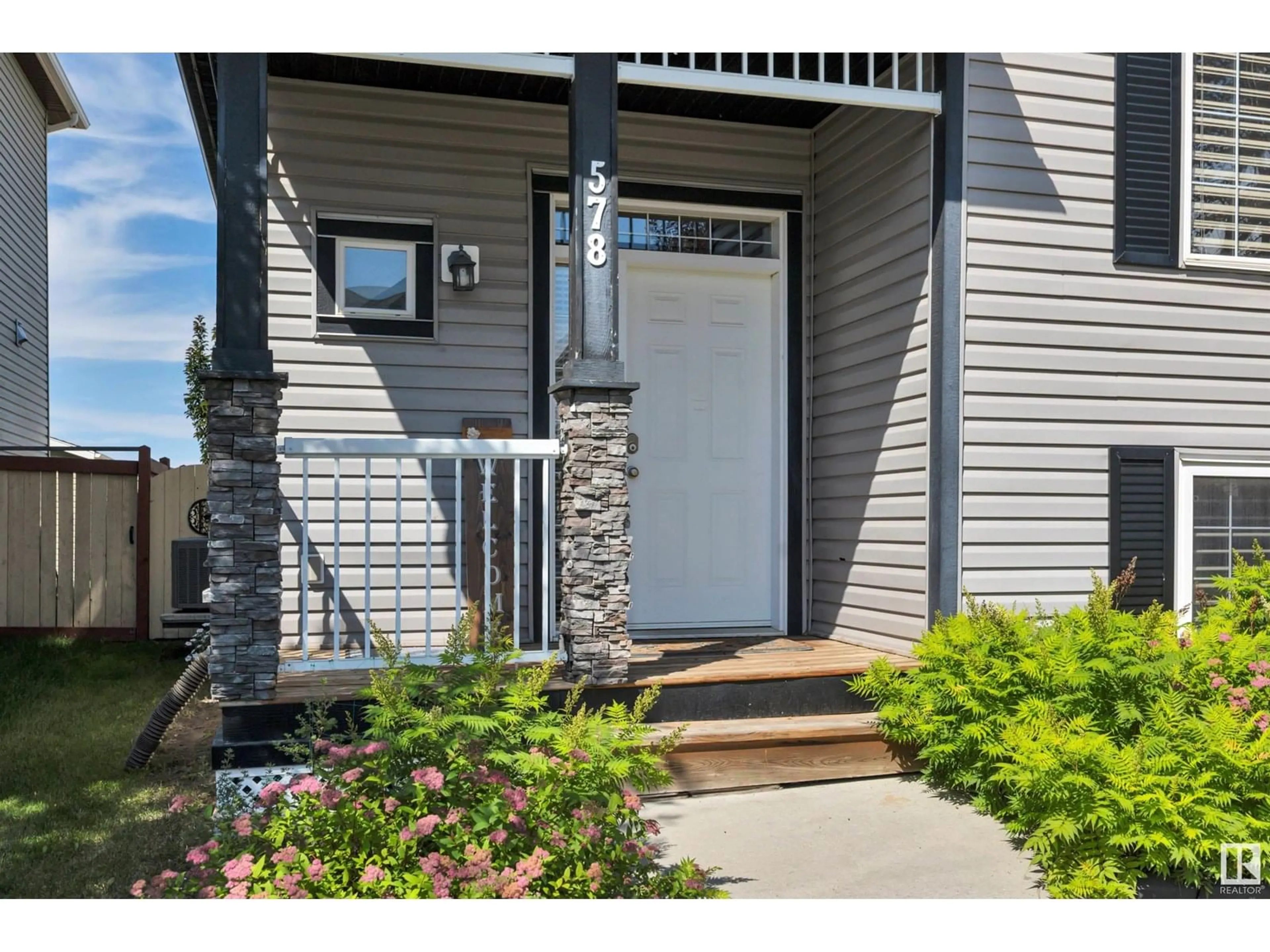 Home with vinyl exterior material, street for 578 SONGHURST WY, Leduc Alberta T9E0R2