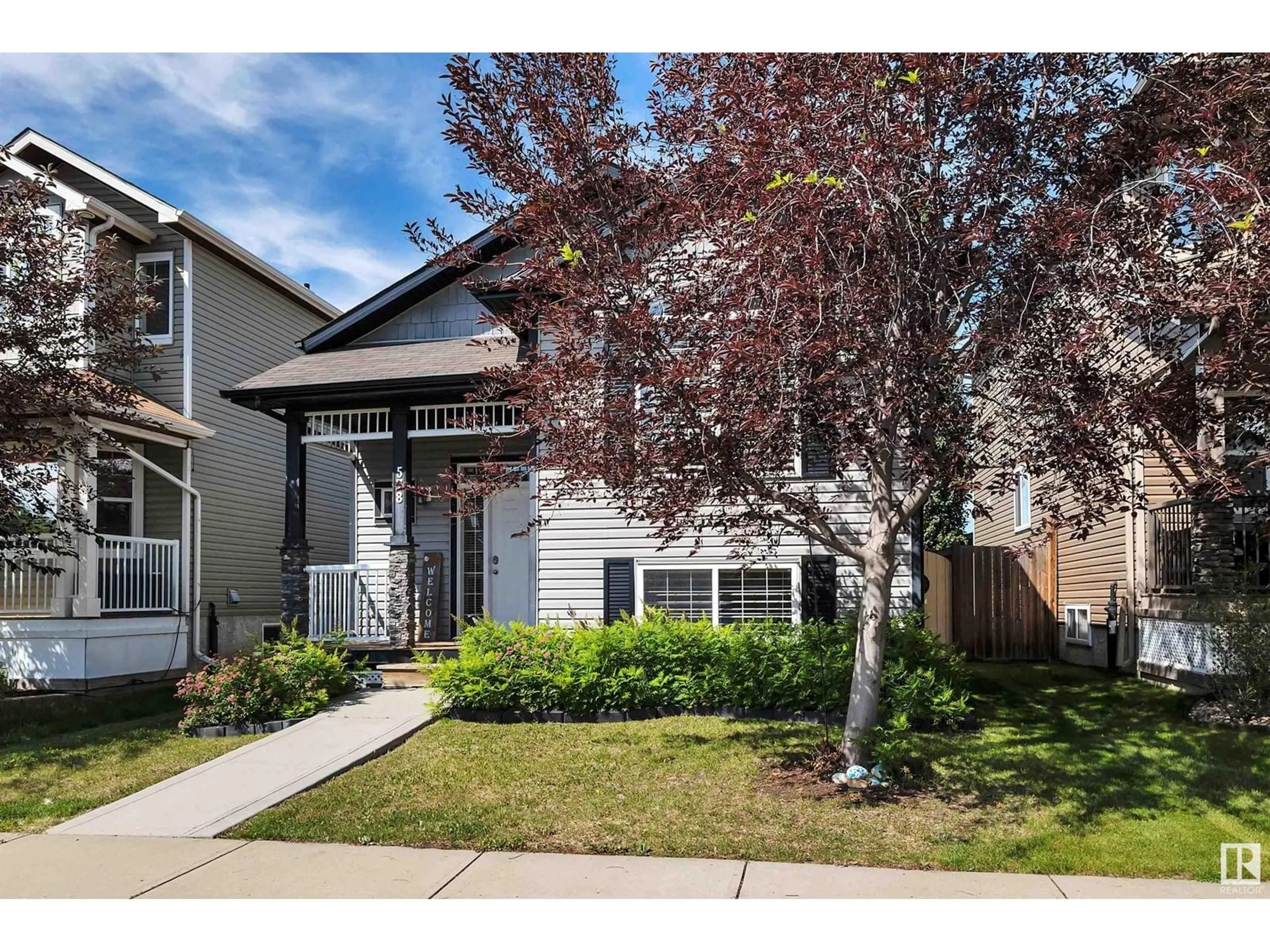 Home with vinyl exterior material, street for 578 SONGHURST WY, Leduc Alberta T9E0R2