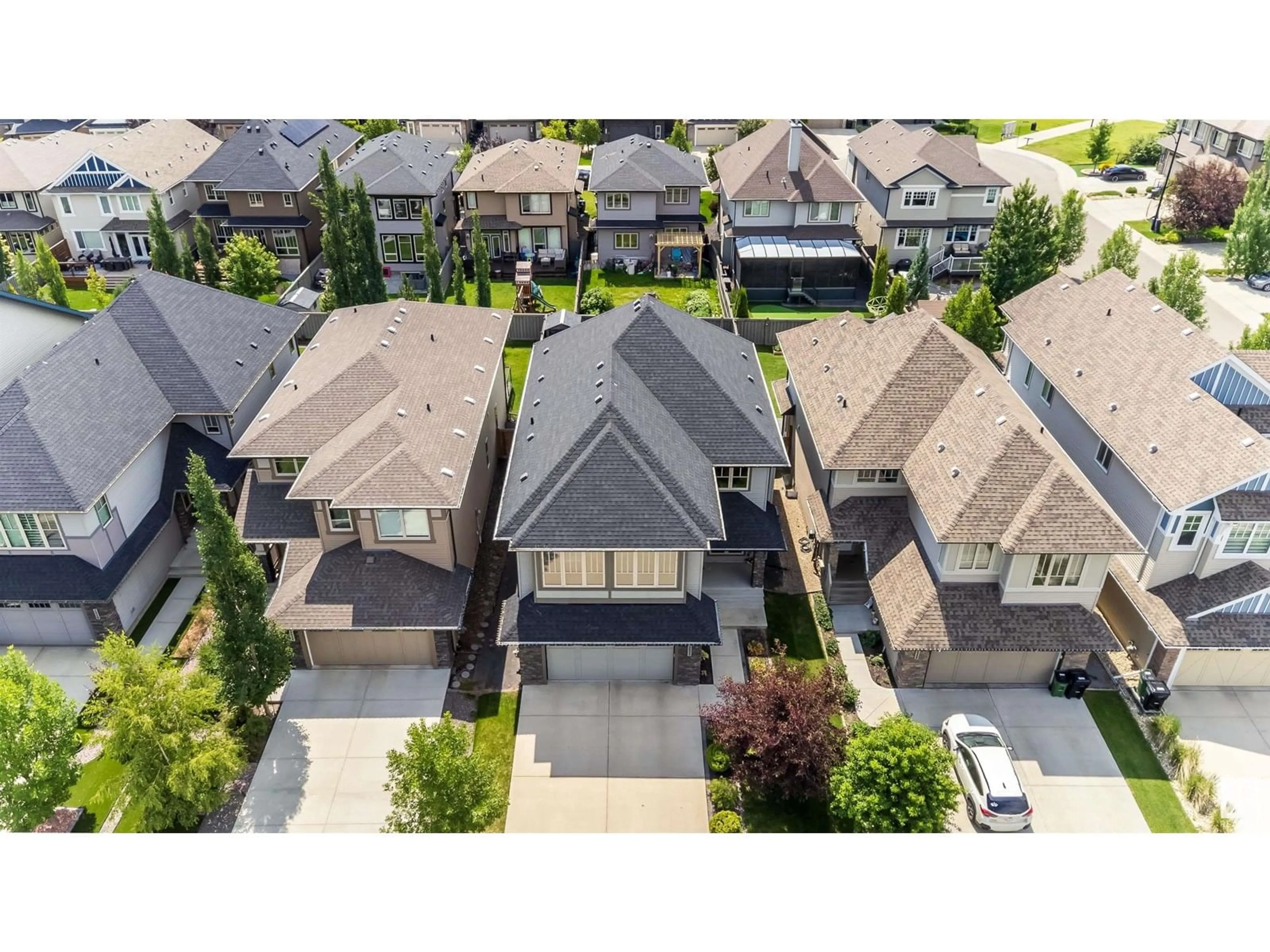 A pic from outside/outdoor area/front of a property/back of a property/a pic from drone, street for LI SW - 2024 AINSLIE LINK, Edmonton Alberta T6W2M2