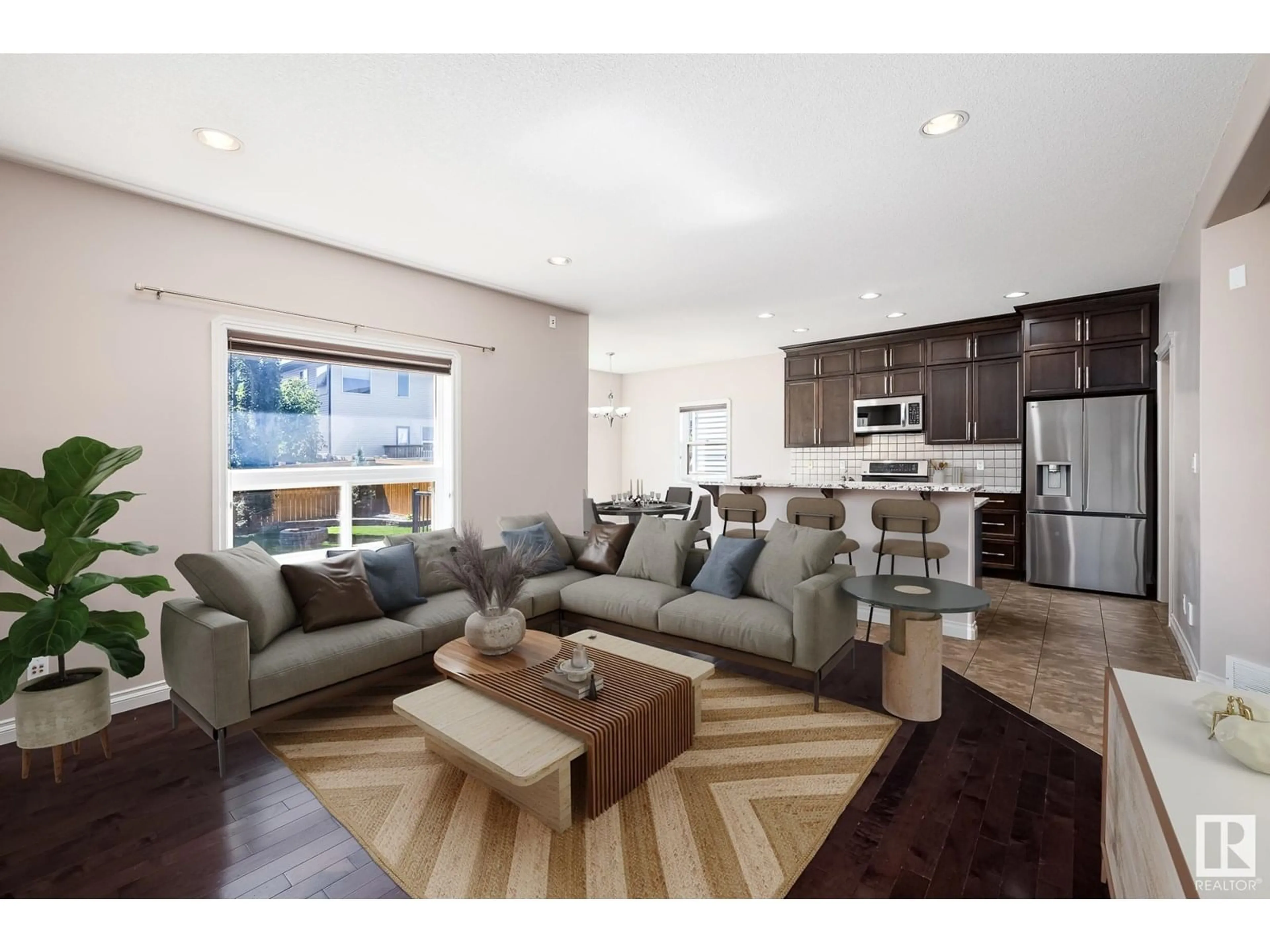 Living room with furniture, wood/laminate floor for 22043 95 AV NW, Edmonton Alberta T5T4A7
