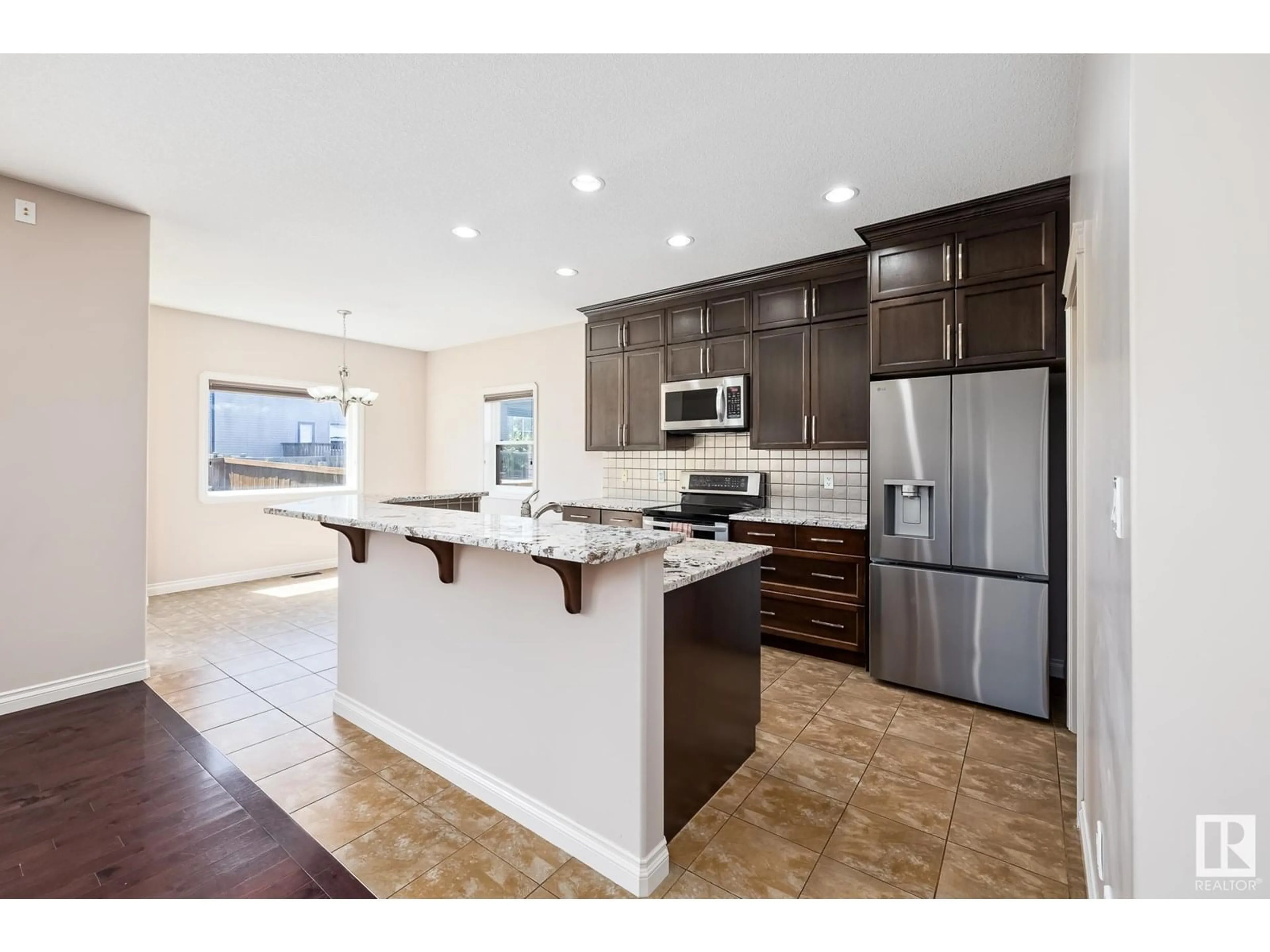 Open concept kitchen, unknown for 22043 95 AV NW, Edmonton Alberta T5T4A7