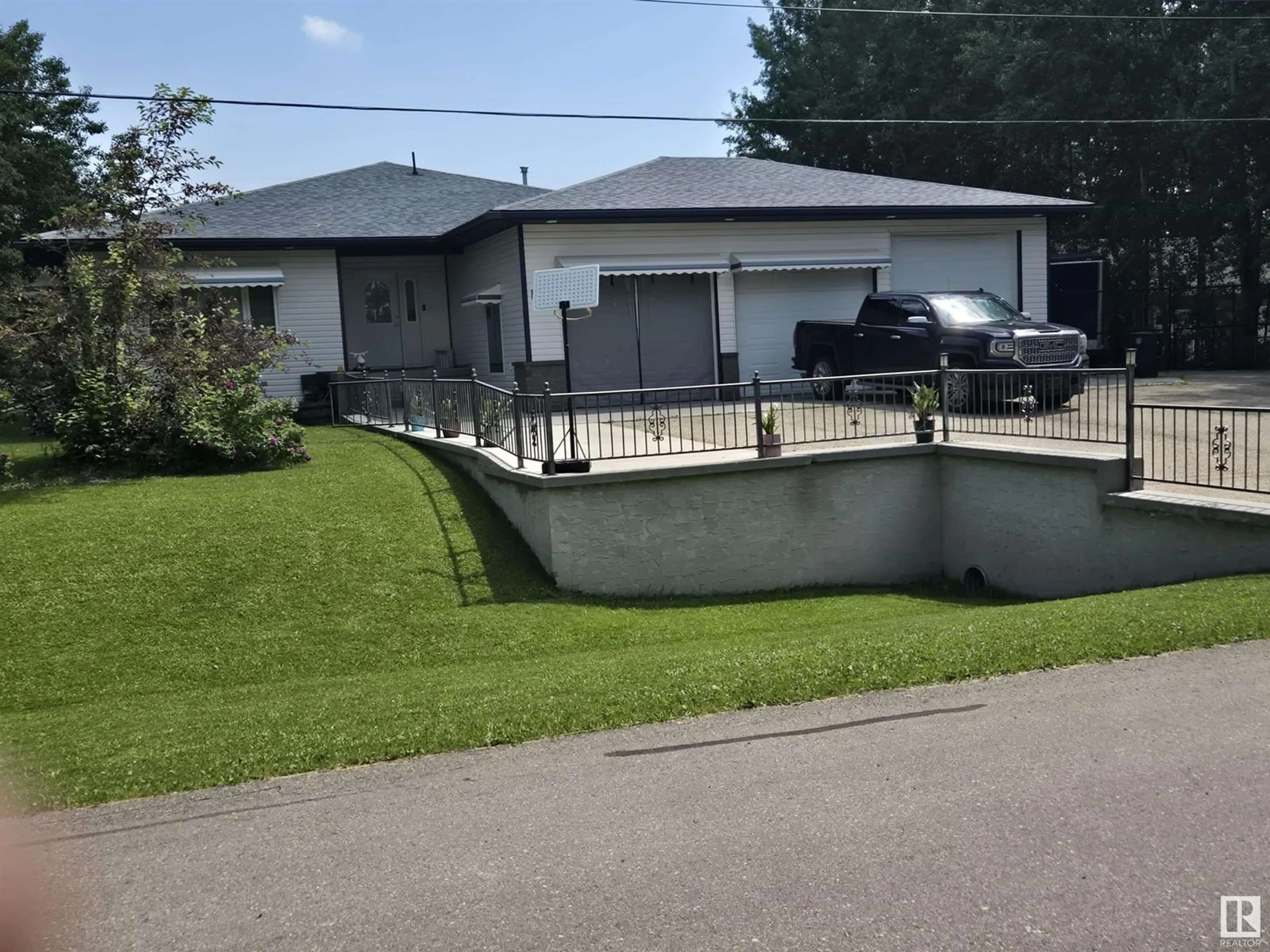 A pic from outside/outdoor area/front of a property/back of a property/a pic from drone, street for 21 POWER DR, Rural Lac Ste. Anne County Alberta T0E0A0