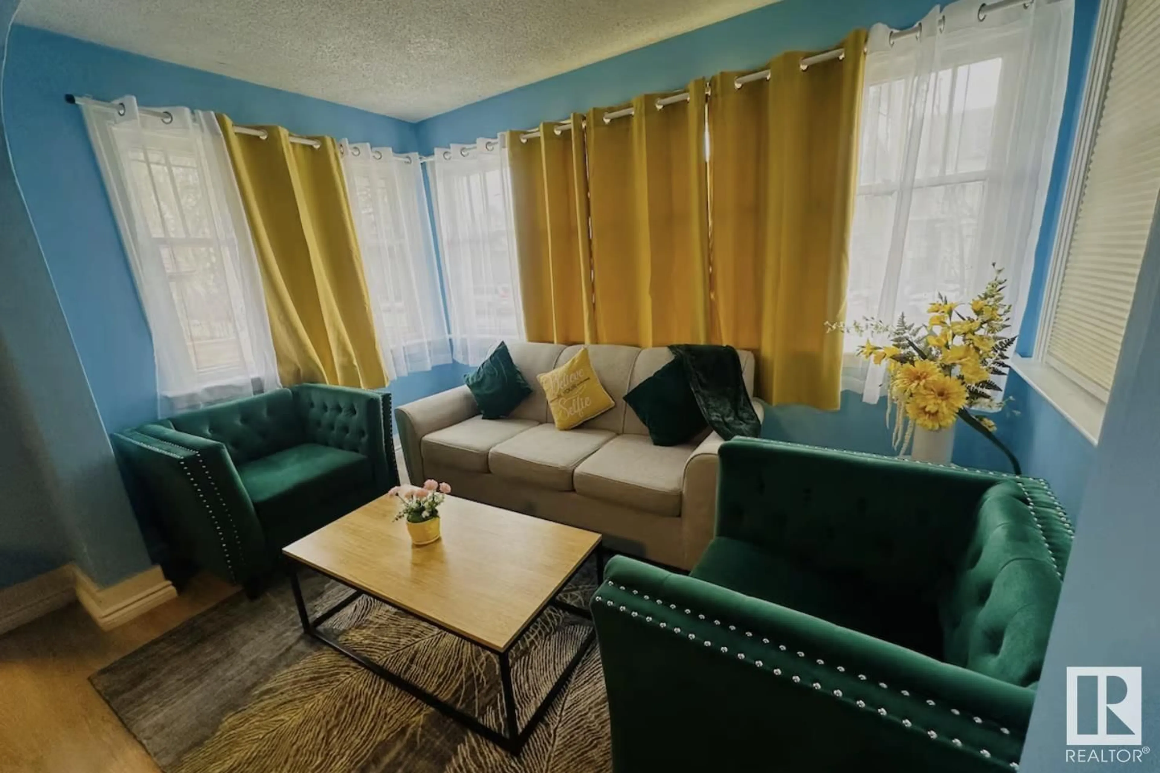 Living room with furniture, unknown for 11044 81 AV, Edmonton Alberta T6G0S4