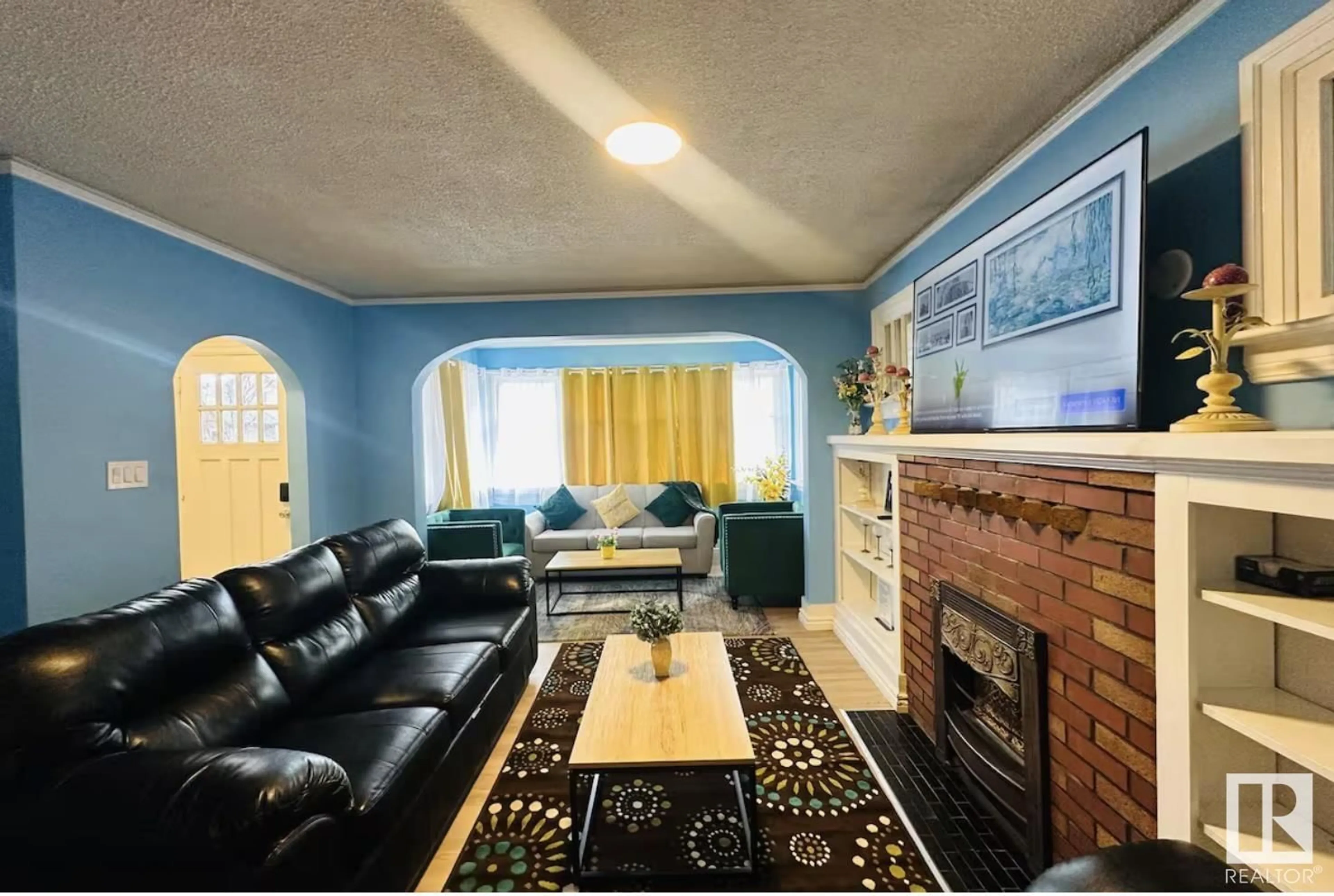 Living room with furniture, unknown for 11044 81 AV, Edmonton Alberta T6G0S4