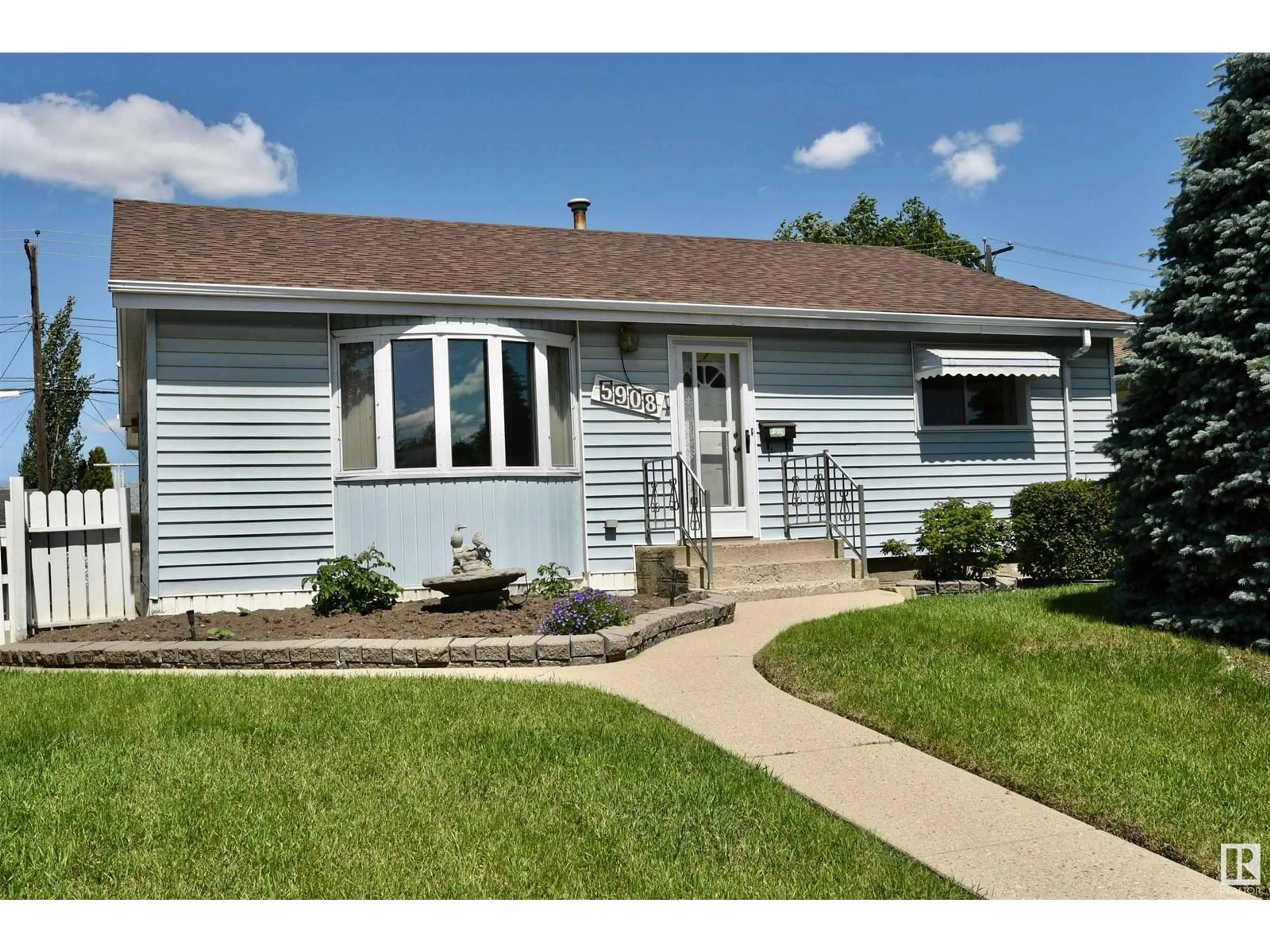 Home with vinyl exterior material, street for 5908 94B AV, Edmonton Alberta T6B0Z4