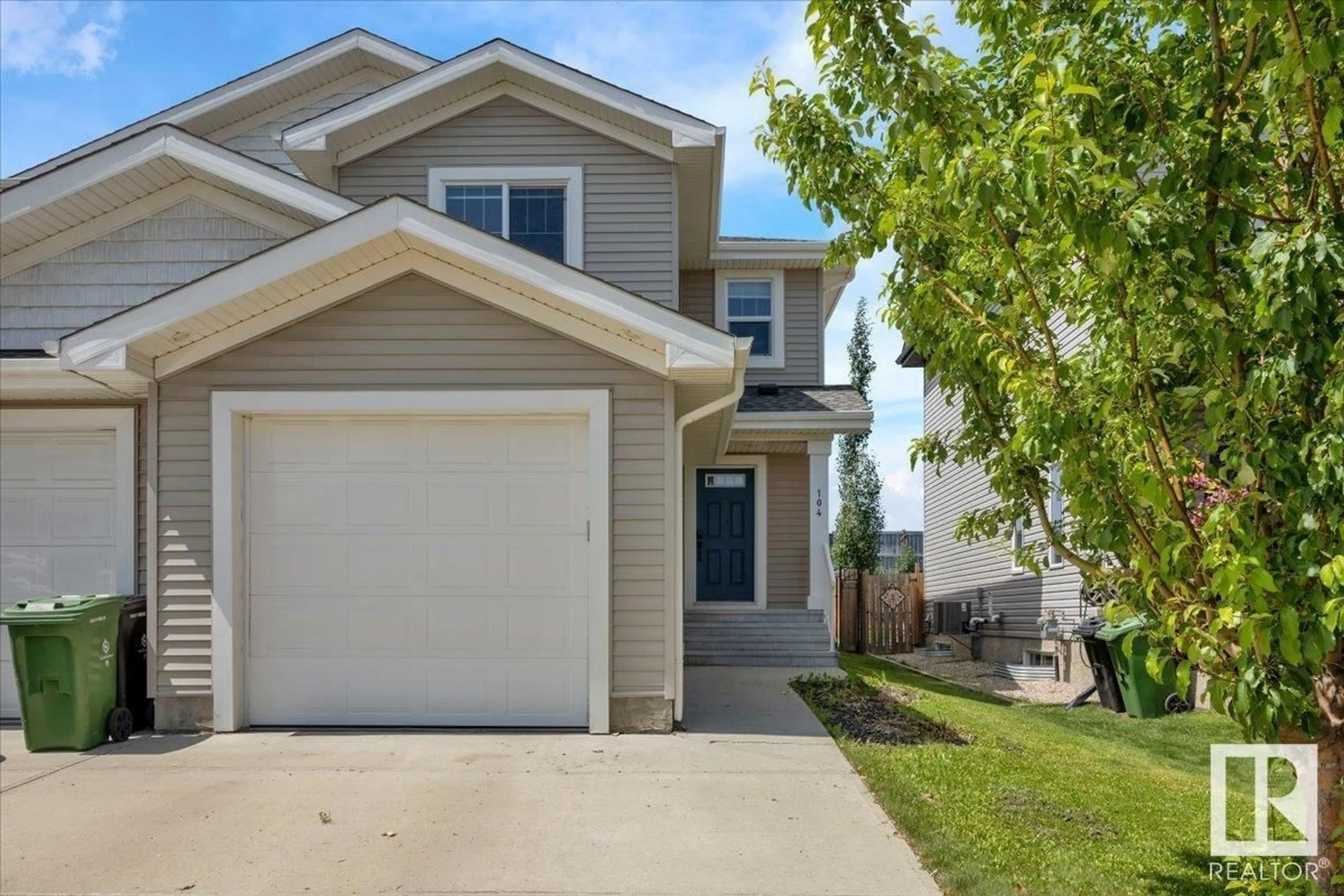Home with vinyl exterior material, street for 104 RADCLIFFE WD, Fort Saskatchewan Alberta T8L0M6