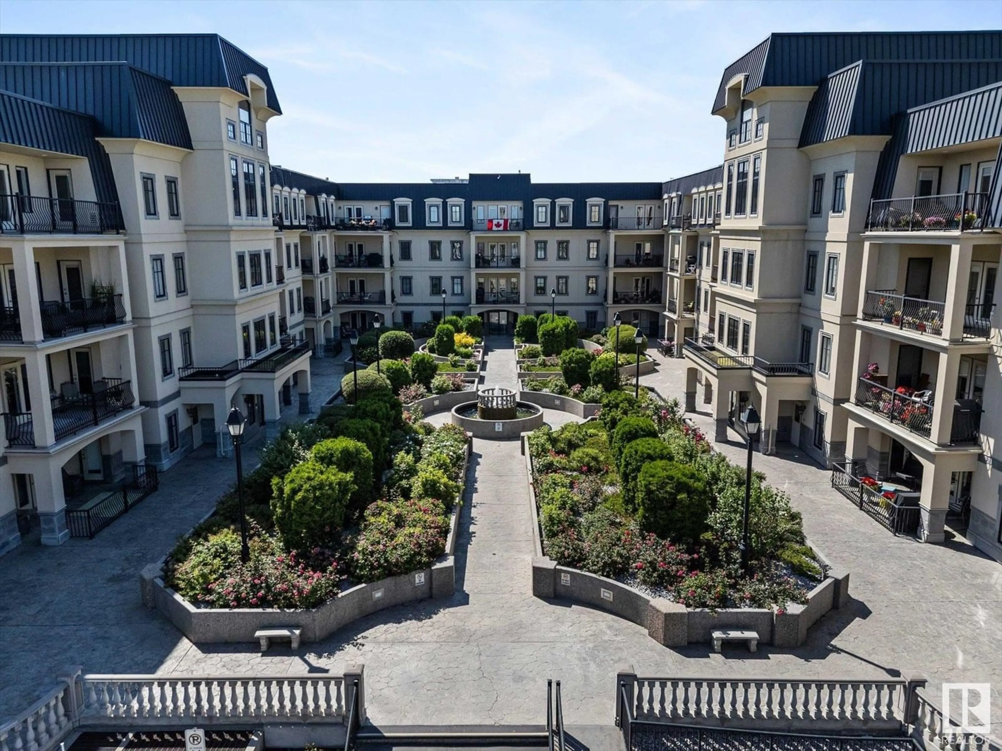 A pic from outside/outdoor area/front of a property/back of a property/a pic from drone, city buildings view from balcony for #101 - 1406 HODGSON WY, Edmonton Alberta T6R3K1