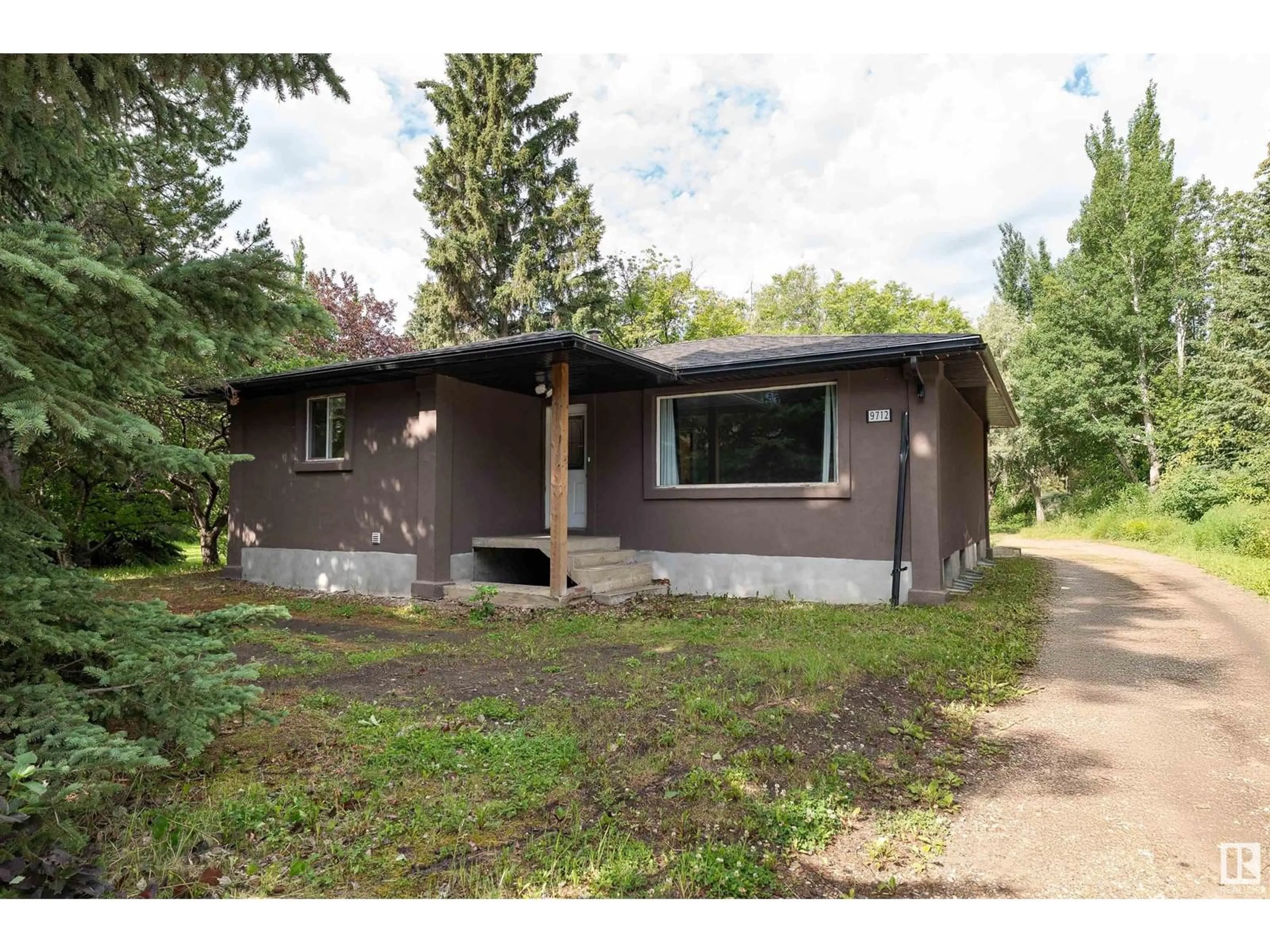 Home with vinyl exterior material, street for NW - 9712 209 ST, Edmonton Alberta T5T5X9