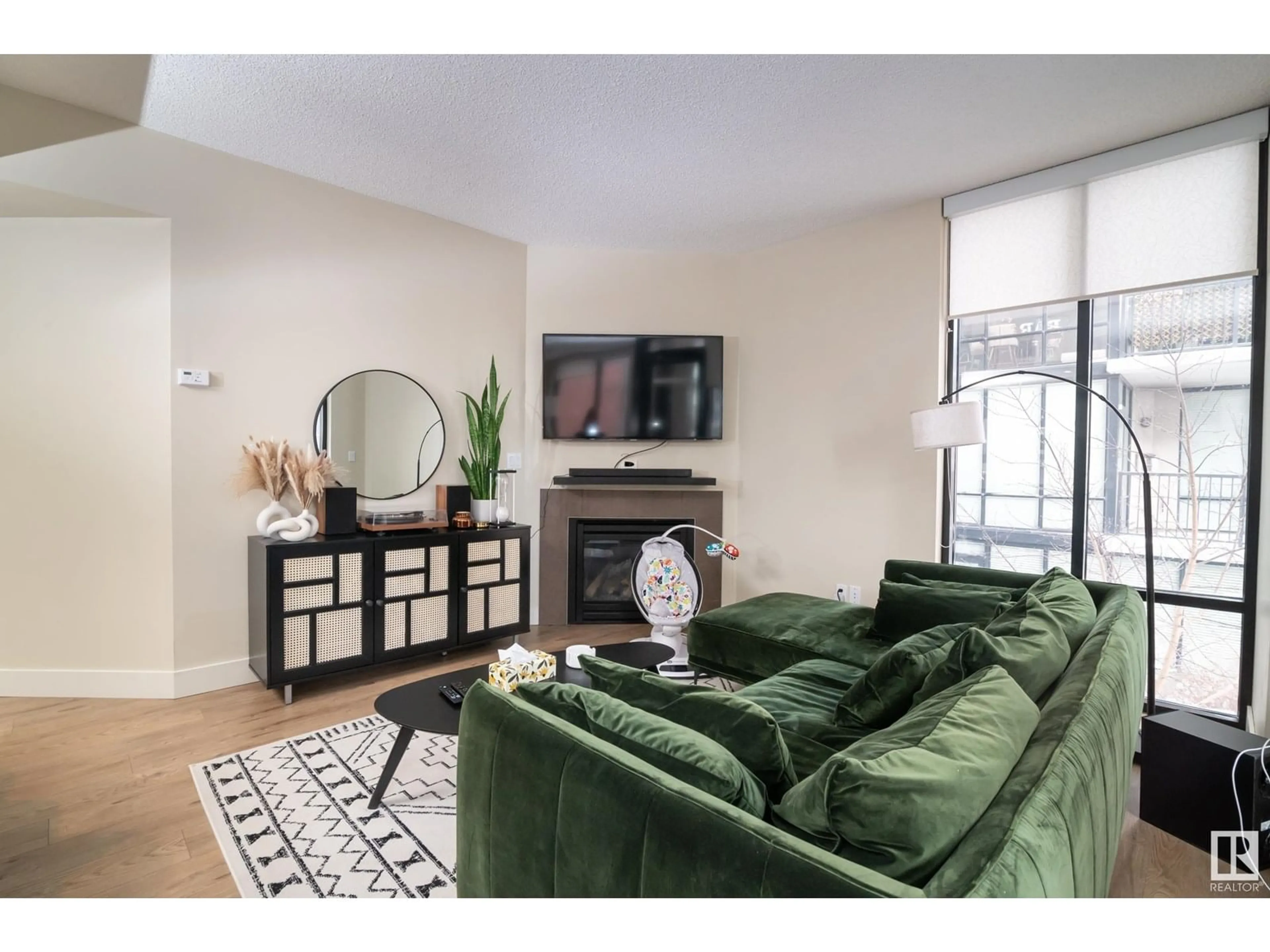Living room with furniture, unknown for 11933 JASPER AV, Edmonton Alberta T5K0P1