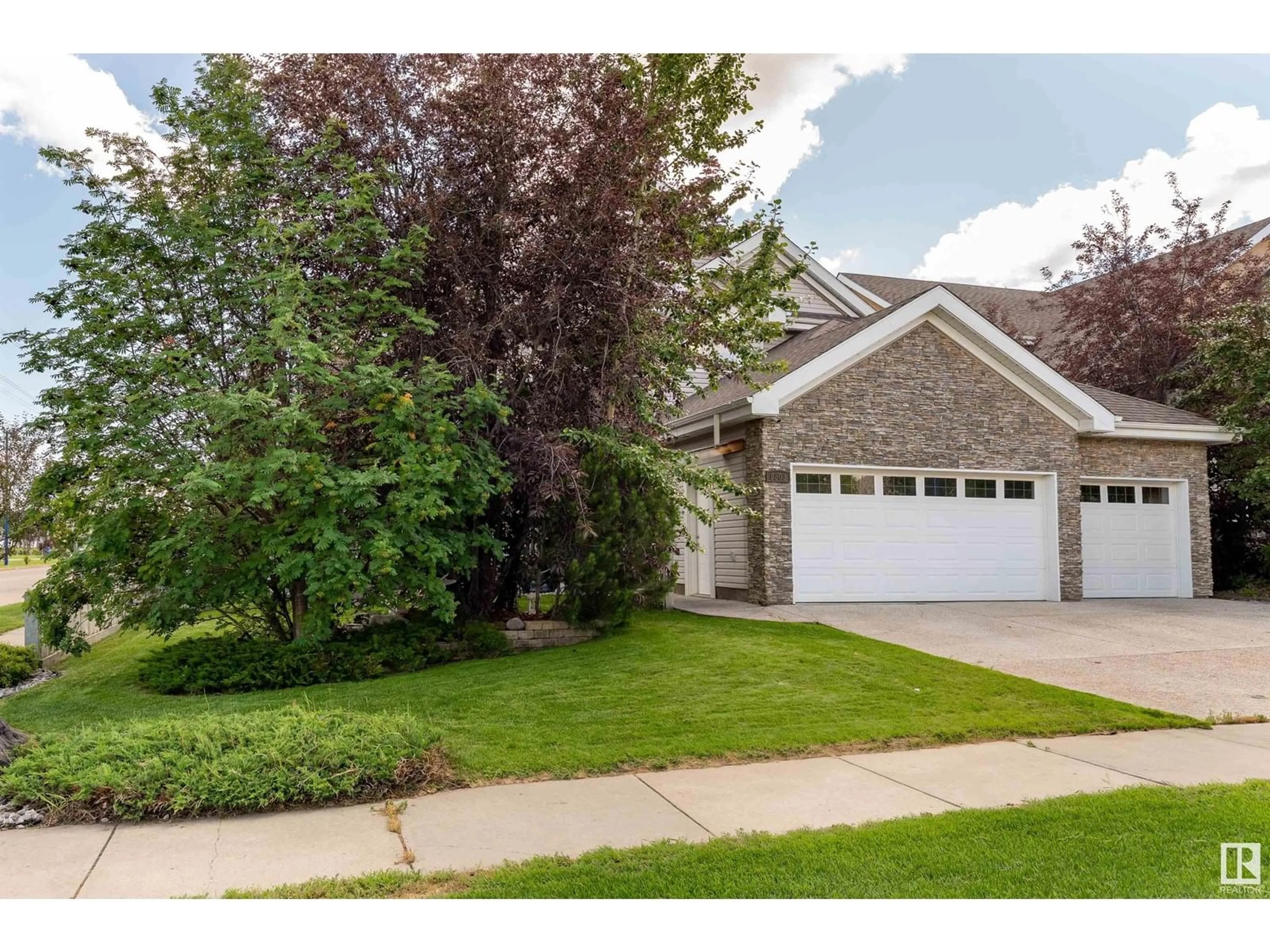 Home with vinyl exterior material, street for SW - 8803 16 AV, Edmonton Alberta T6X1J7