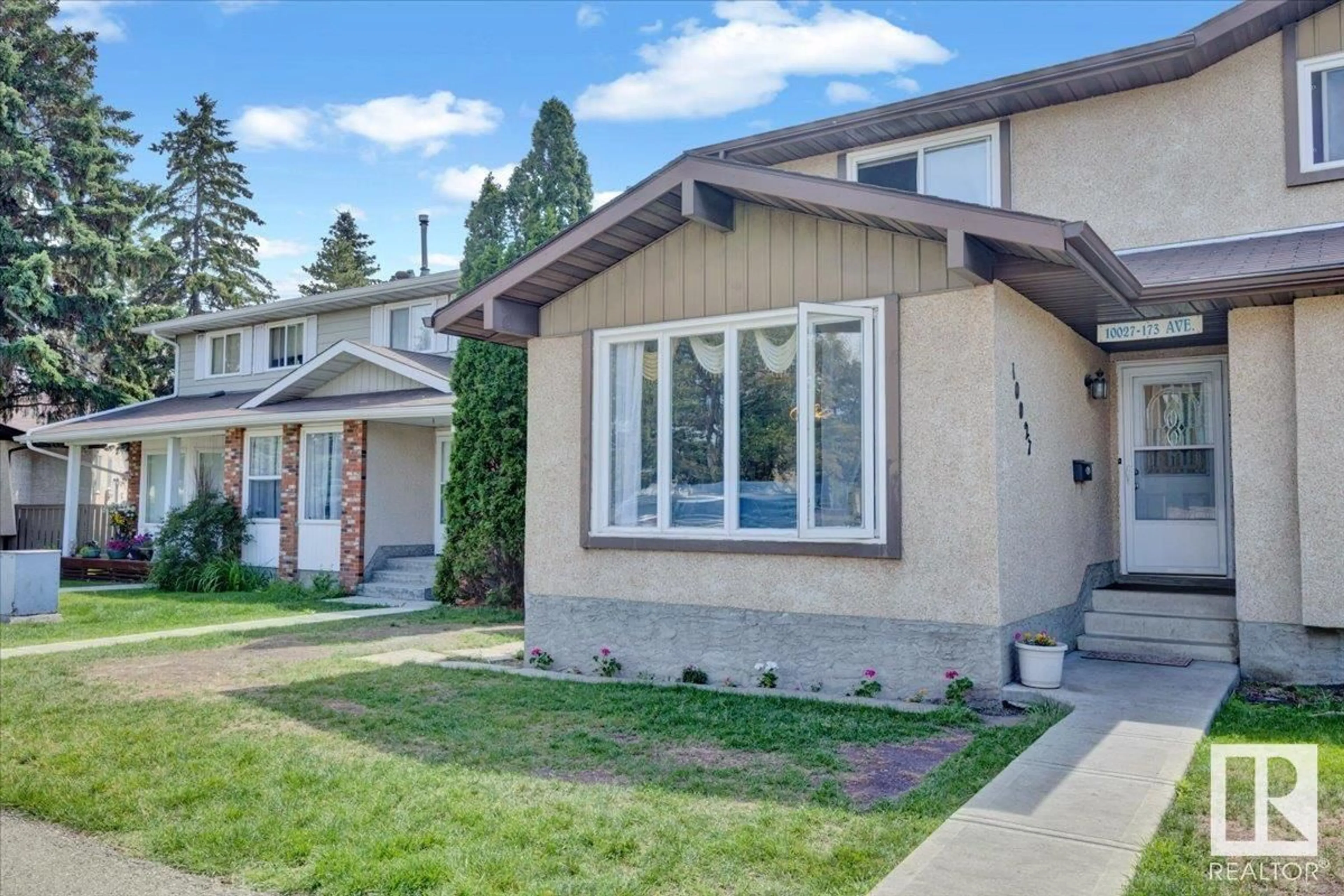 Home with vinyl exterior material, street for 10027 173 AVE, Edmonton Alberta T5X3Y1