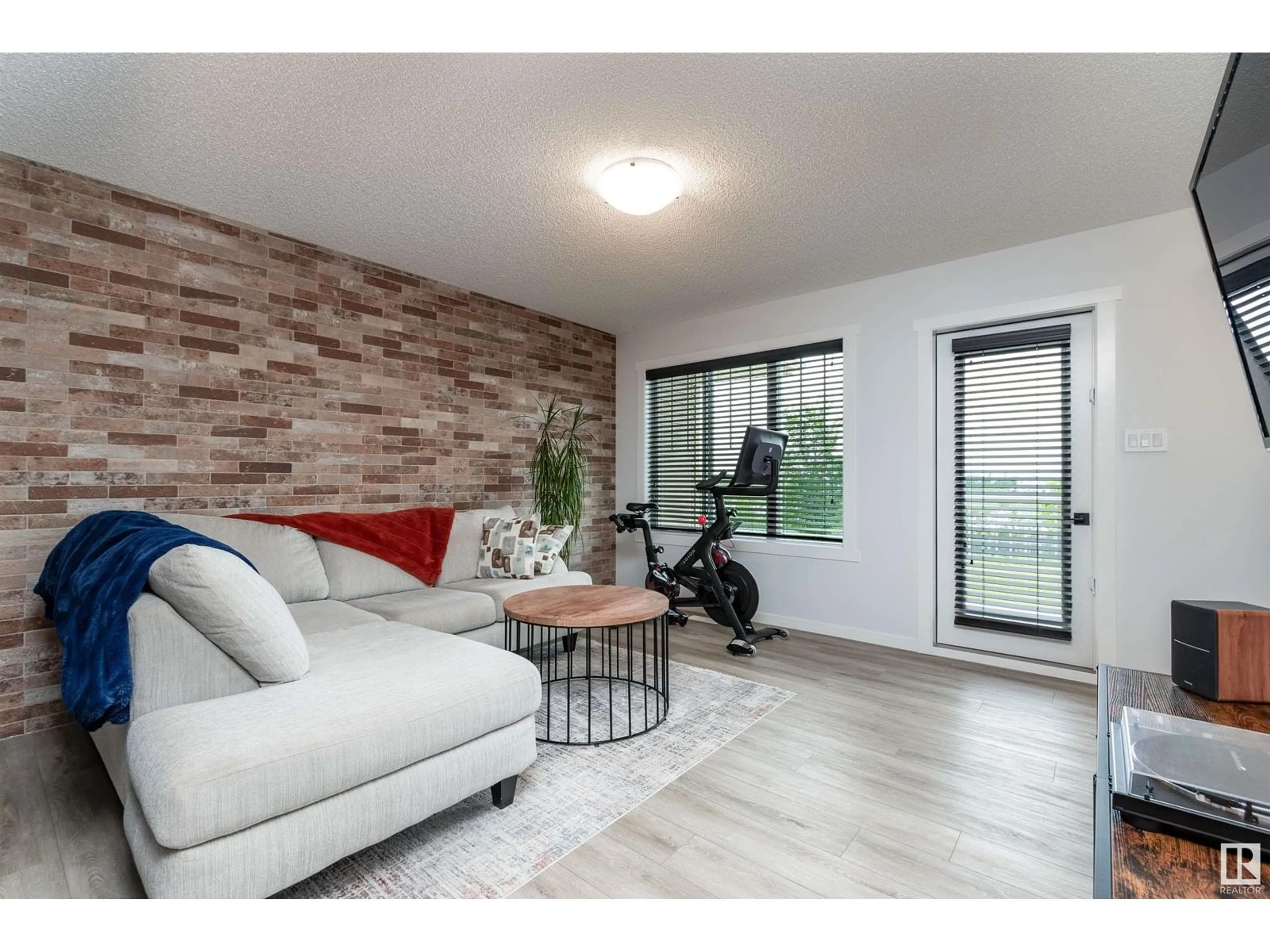 Living room with furniture, wood/laminate floor for #44 - 17832 78 ST, Edmonton Alberta T5Z0P7