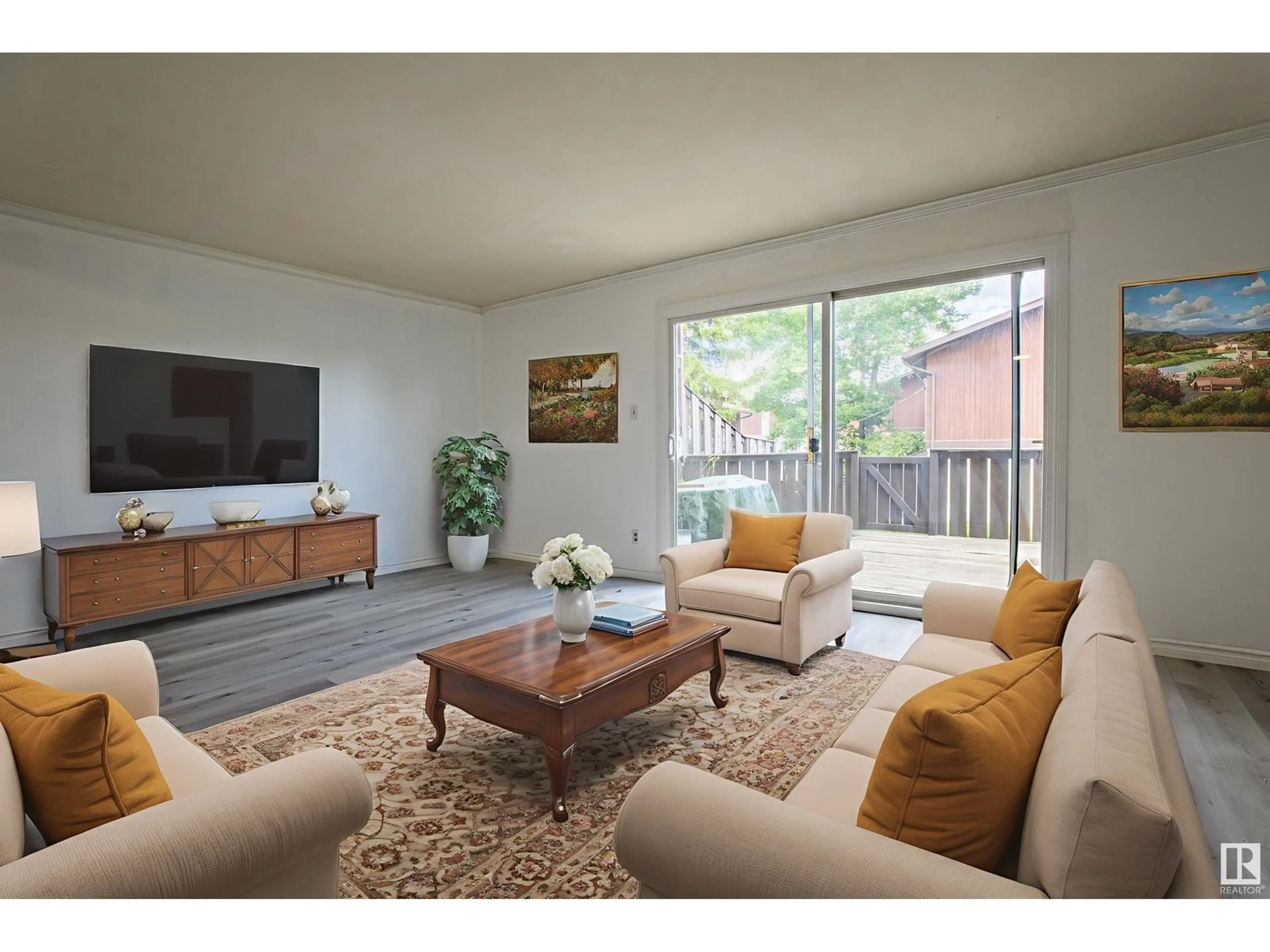Living room with furniture, wood/laminate floor for NW - 7605 176 ST, Edmonton Alberta T5T0J4
