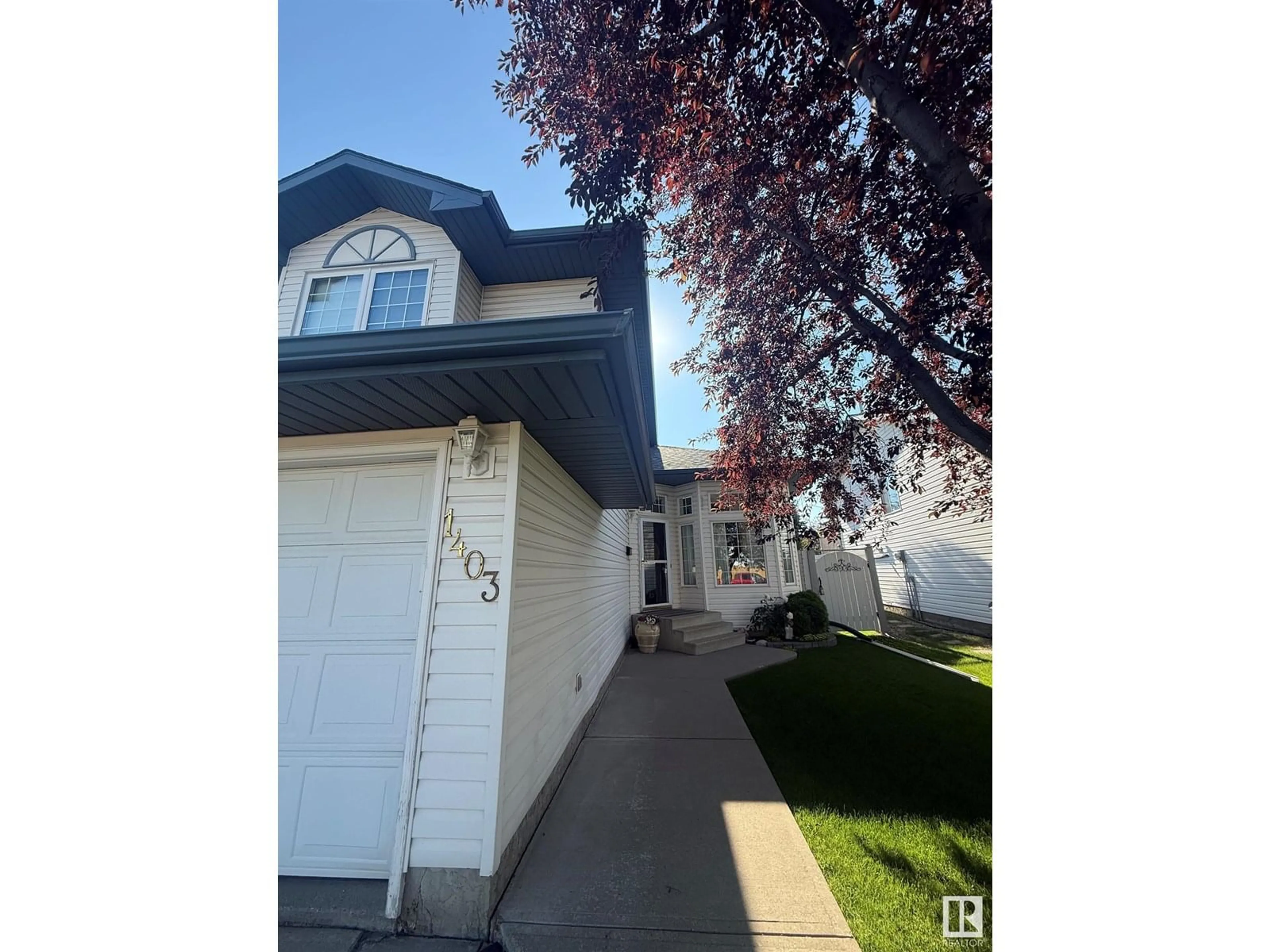 Home with vinyl exterior material, street for 1403 JEFFERYS CR, Edmonton Alberta T6L6T4