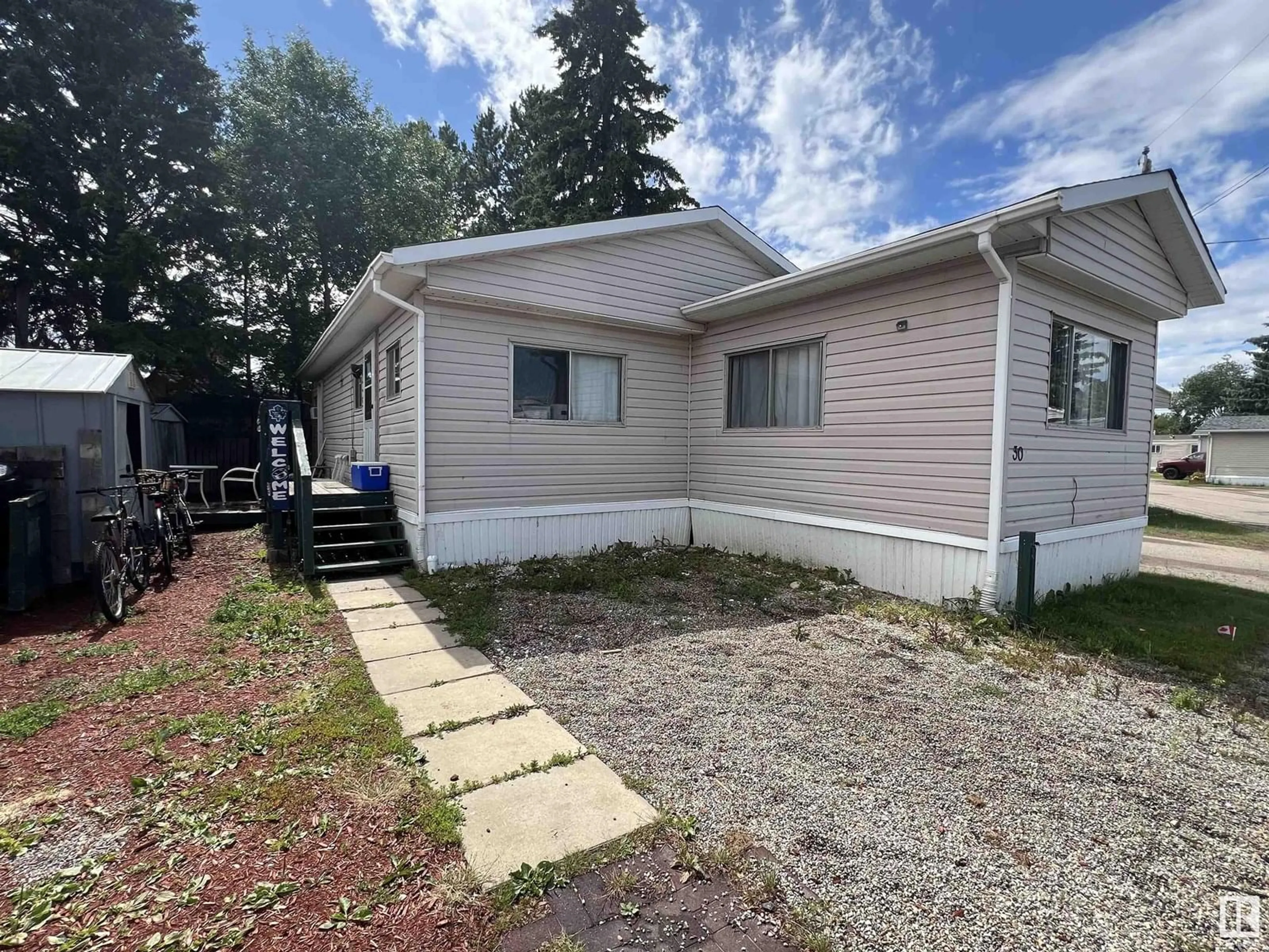 Home with vinyl exterior material, street for #30 - 10410 101A ST, Morinville Alberta T8R1B1