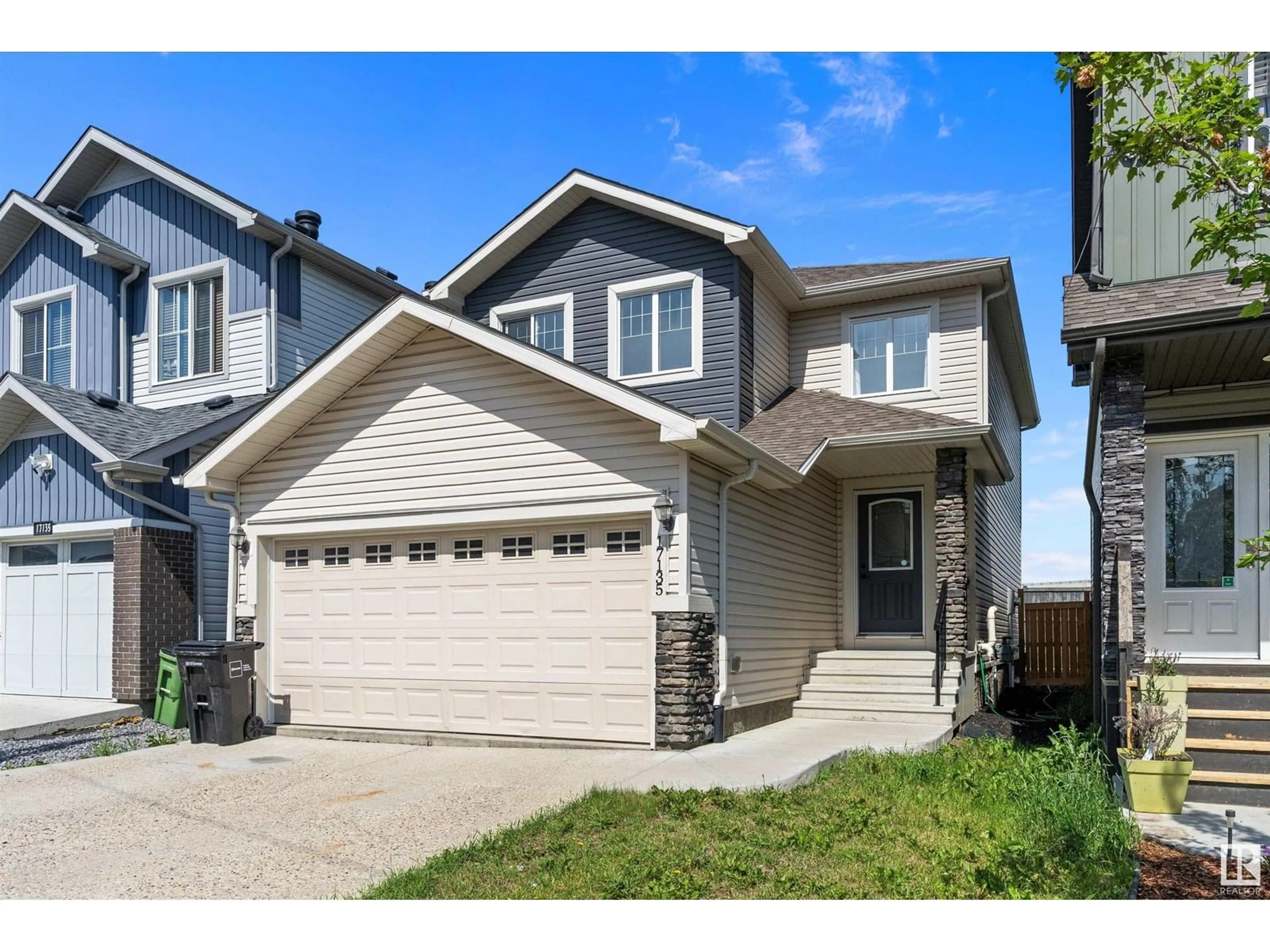 Home with vinyl exterior material, street for 17135 38 ST, Edmonton Alberta T5Z3R7