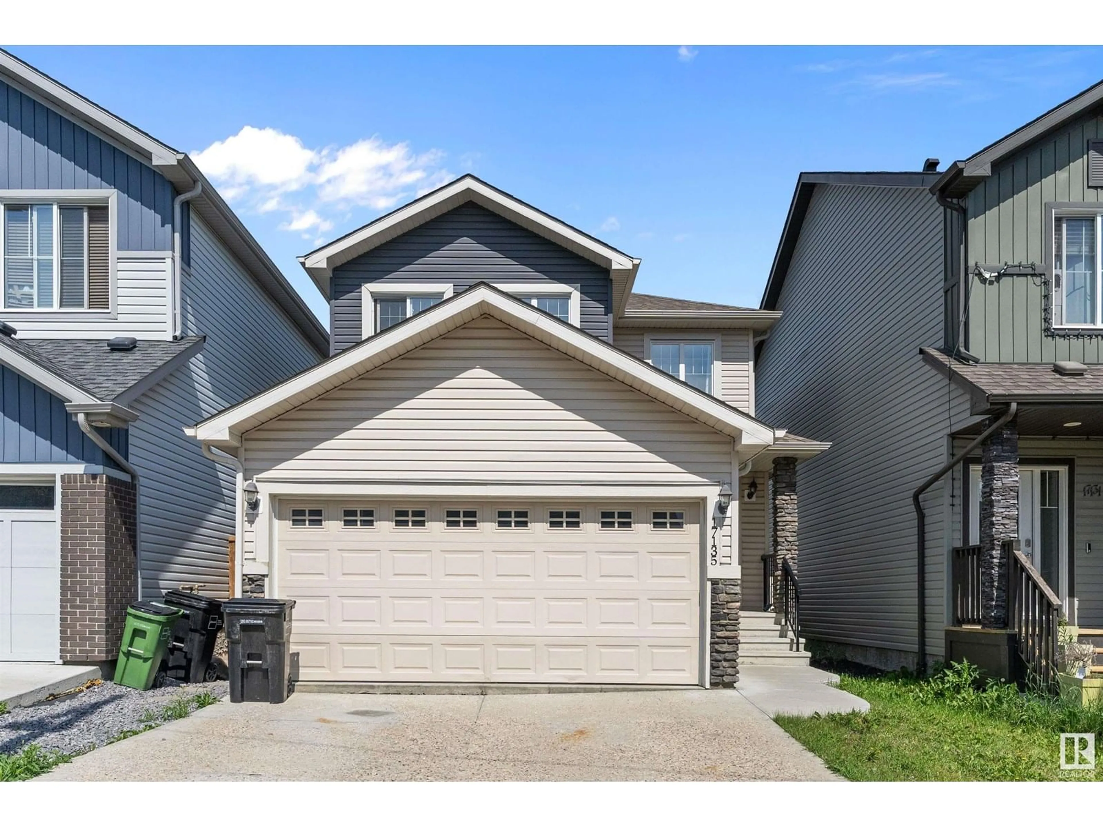 Home with vinyl exterior material, street for 17135 38 ST, Edmonton Alberta T5Z3R7
