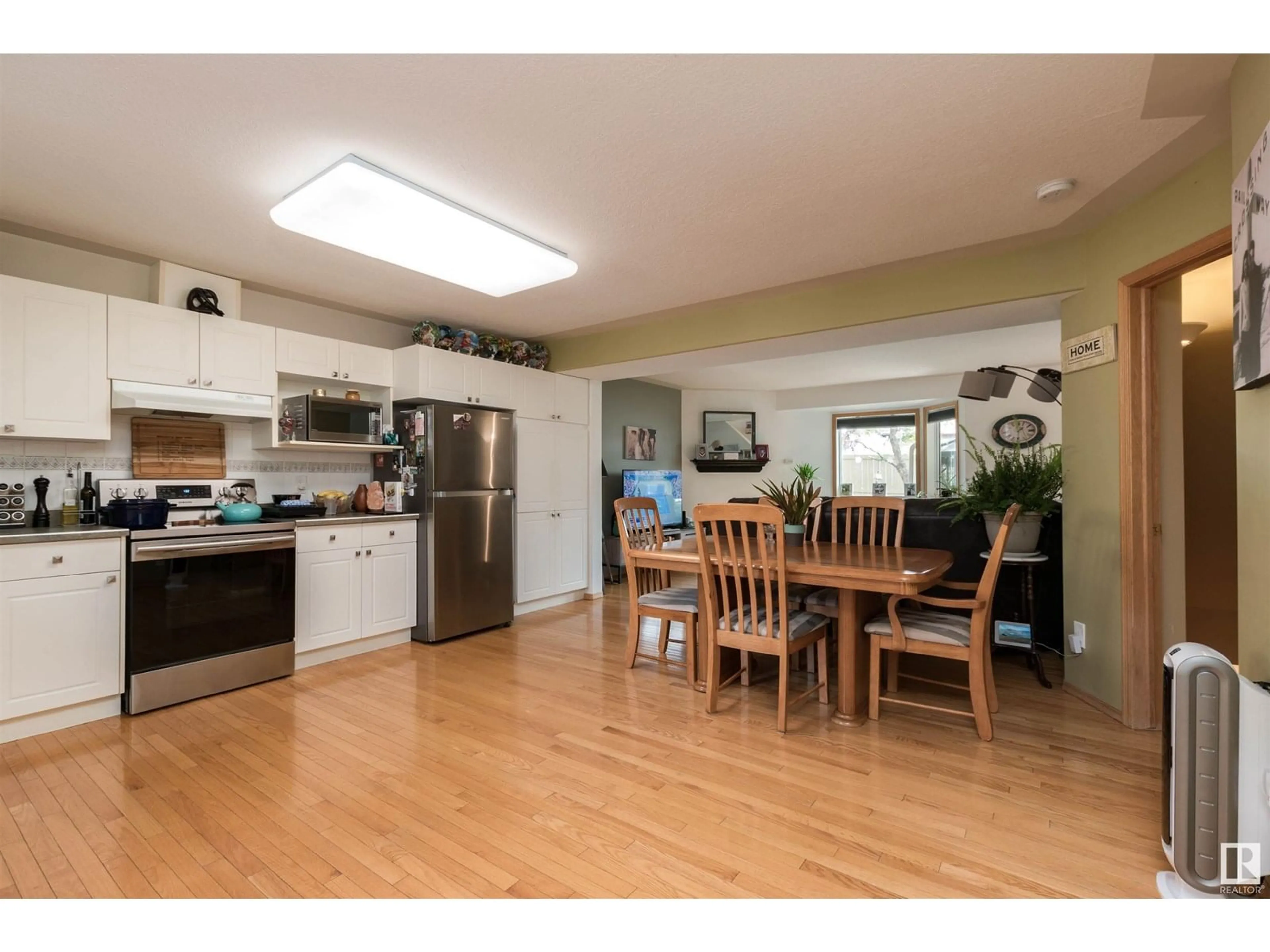 Open concept kitchen, wood/laminate floor for #24 - 901 NORMANDY DR, Sherwood Park Alberta T8A5V7