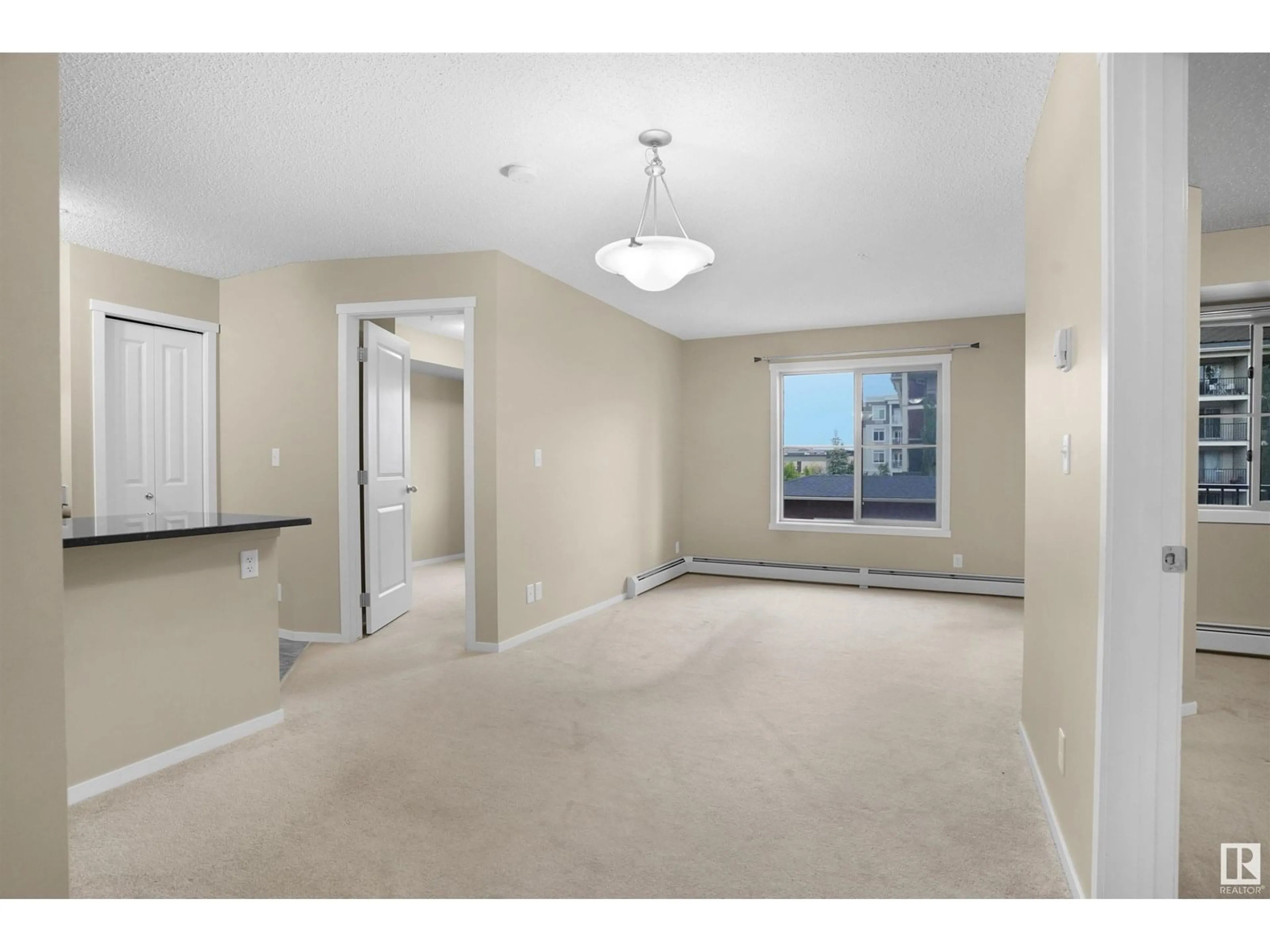 A pic of a room for #214 - 5816 MULLEN PL, Edmonton Alberta T6R0W3