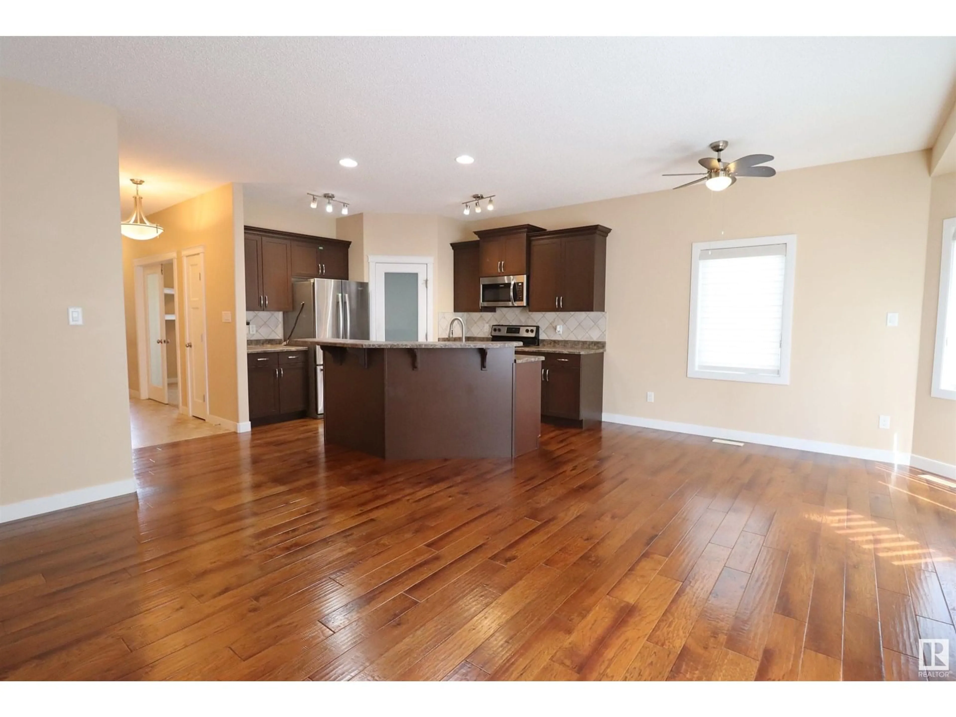 Open concept kitchen, wood/laminate floor for #17 - 340 SPRUCE RIDGE RD, Spruce Grove Alberta T7X0J4
