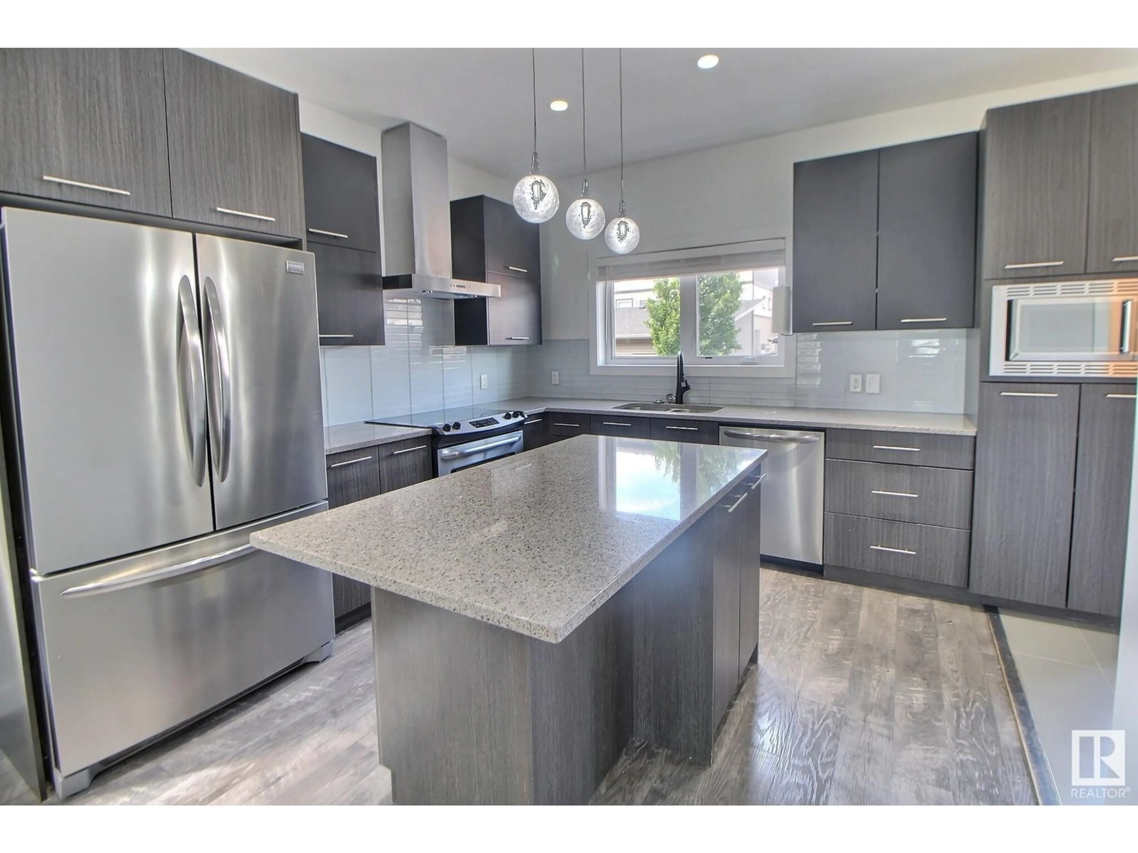 Open concept kitchen, unknown for 11 KENTON WY, Spruce Grove Alberta T7X0P7