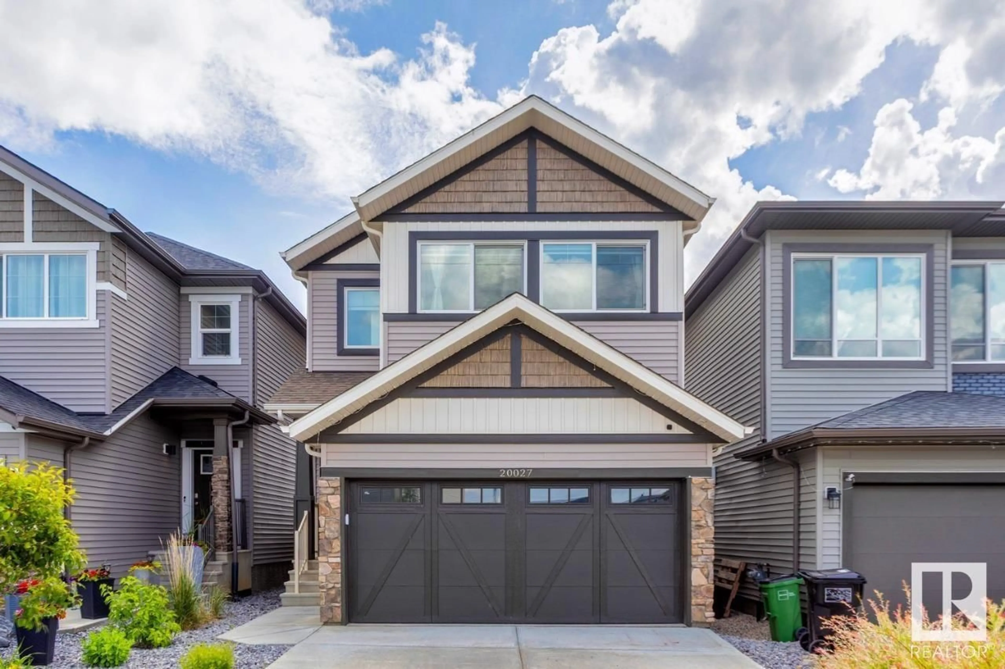 Home with vinyl exterior material, street for 20027 26 AV, Edmonton Alberta T6M1K3