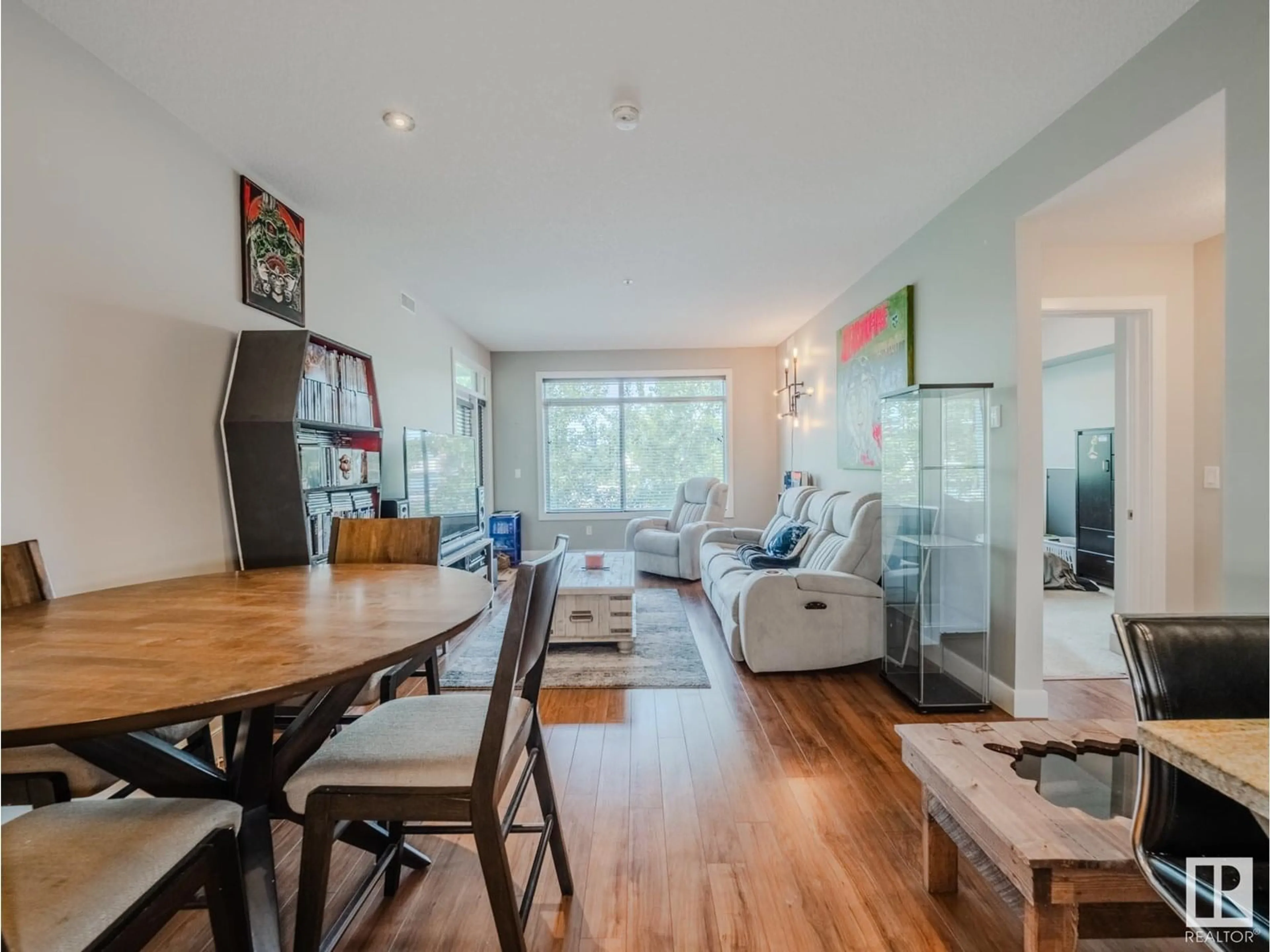 Living room with furniture, wood/laminate floor for #213 - 279 WYE RD, Sherwood Park Alberta T8B0A7
