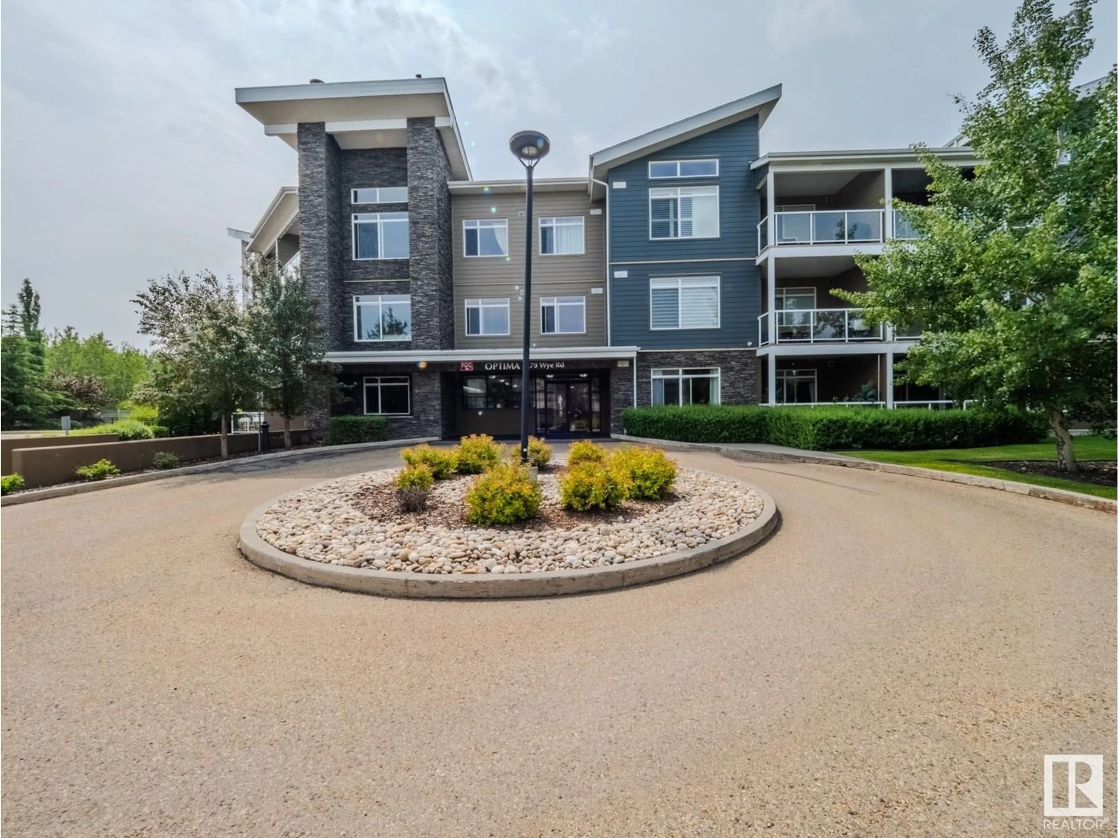 A pic from outside/outdoor area/front of a property/back of a property/a pic from drone, water/lake/river/ocean view for #213 - 279 WYE RD, Sherwood Park Alberta T8B0A7