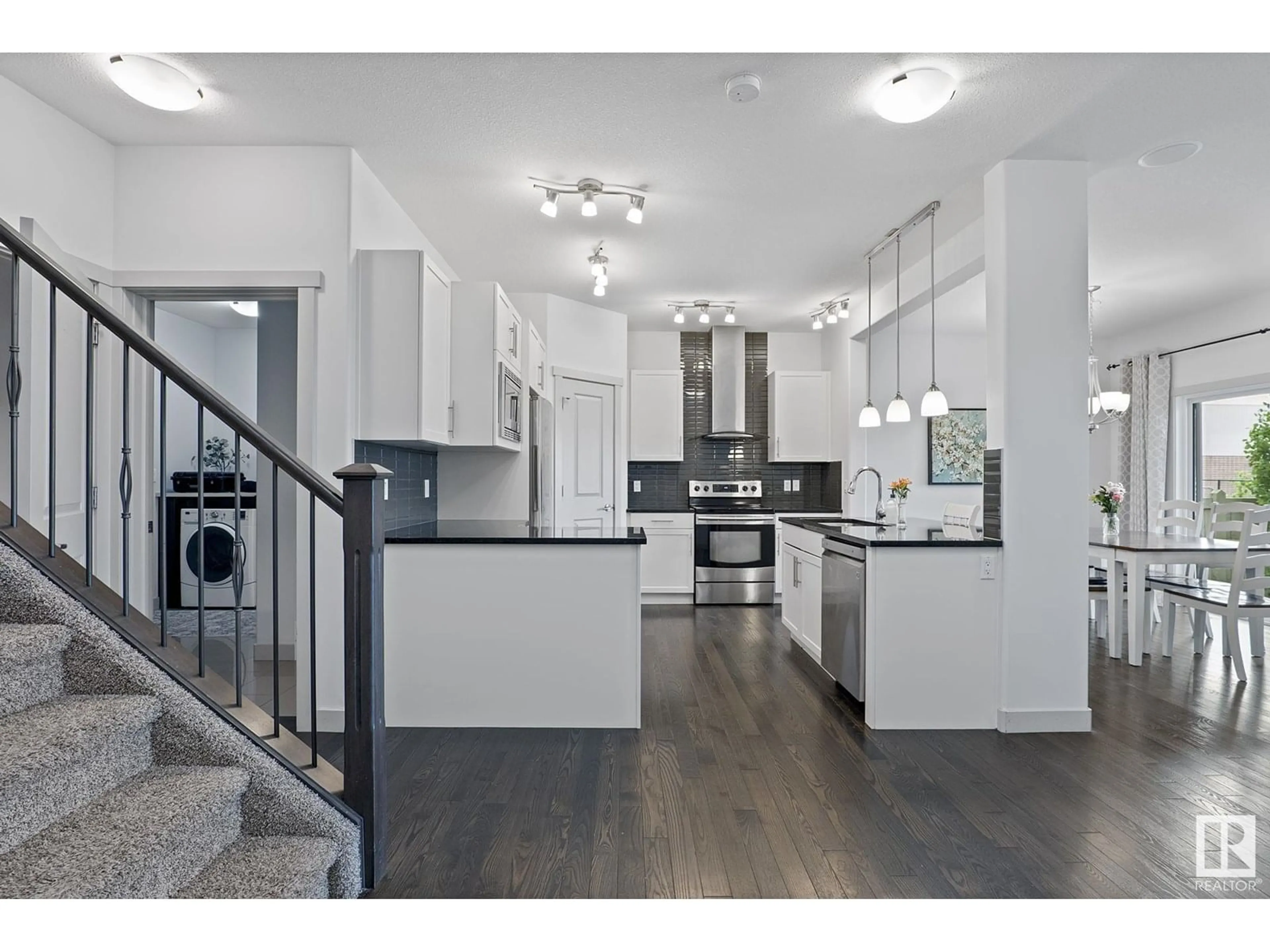 Open concept kitchen, unknown for 1308 56 ST, Edmonton Alberta T6W1R4