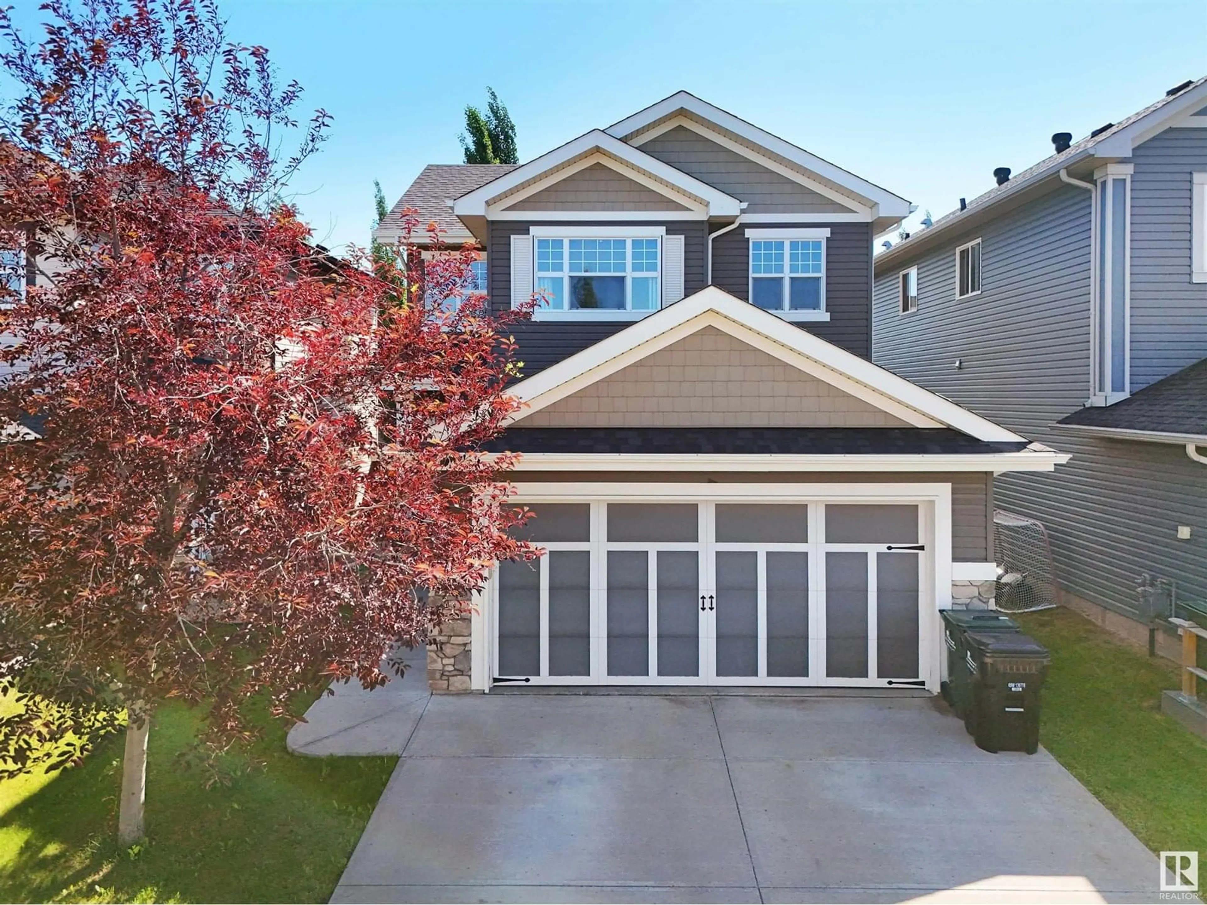 Home with vinyl exterior material, street for 7733 ELLESMERE LN, Sherwood Park Alberta T8H0P7