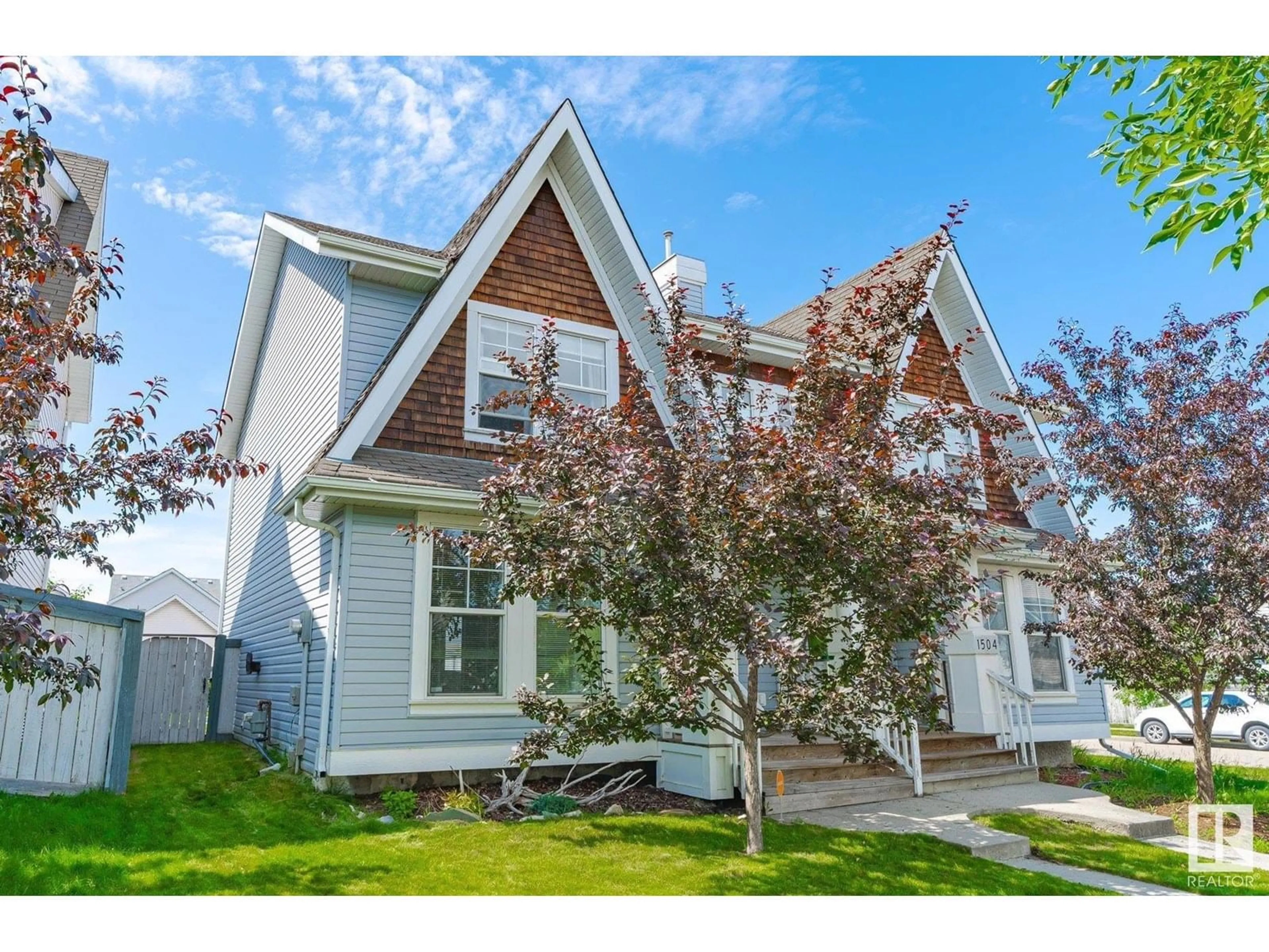 Home with vinyl exterior material, street for 1506 75 ST, Edmonton Alberta T6X0E1
